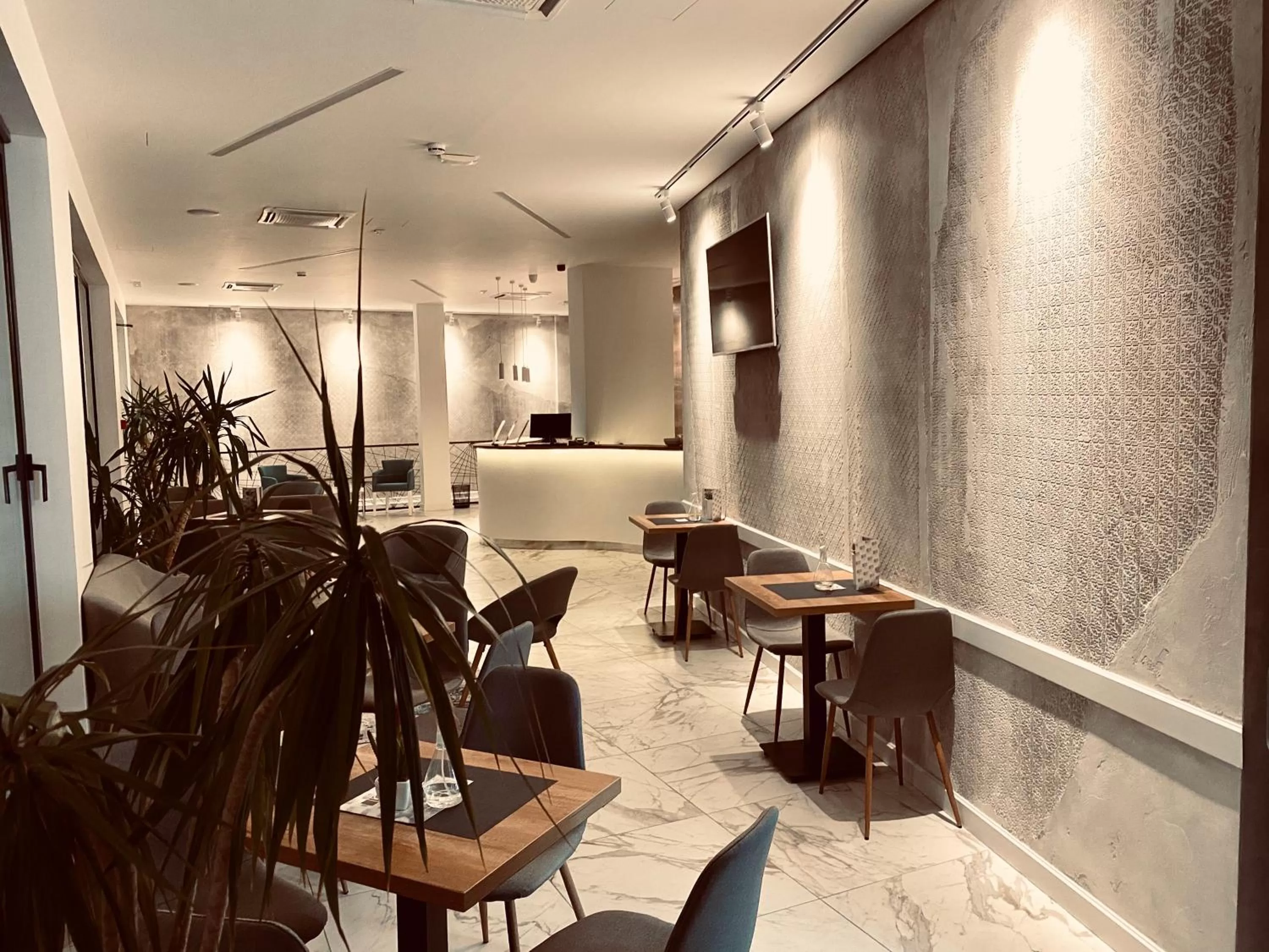 Lobby or reception, Restaurant/Places to Eat in IG Hotel