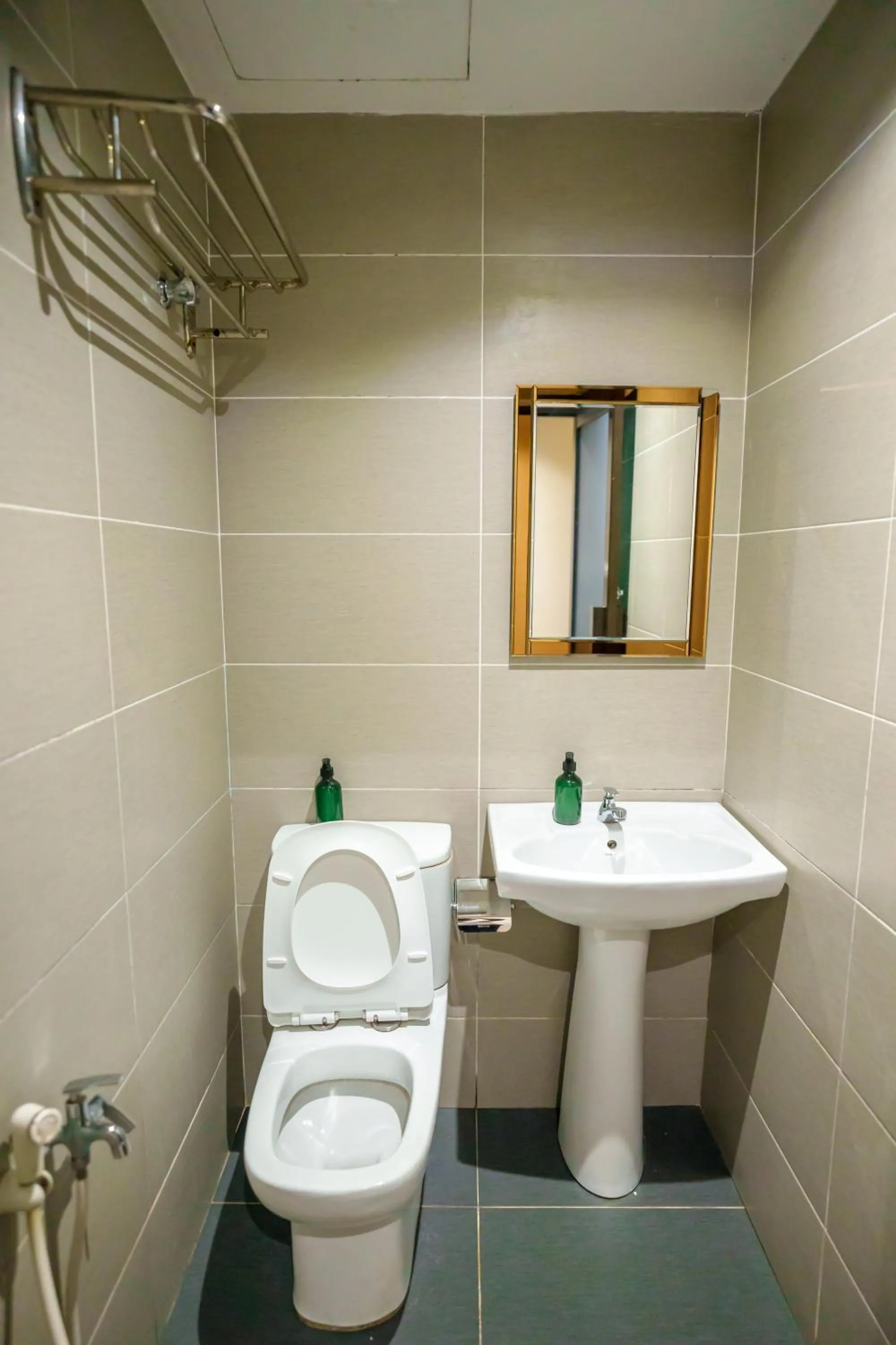 Toilet in Alaxis Hotel