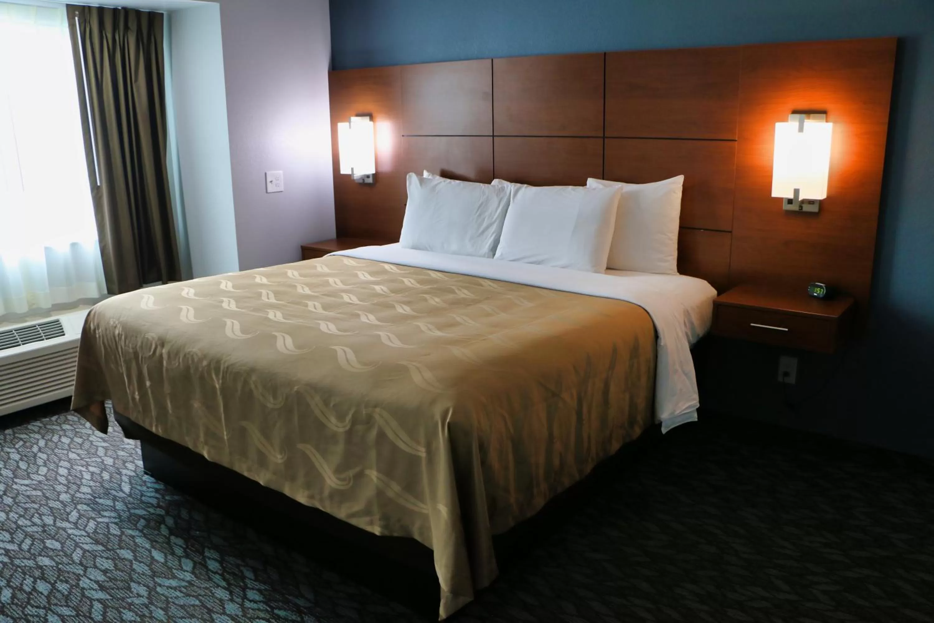 Bed in Quality Inn & Suites Watertown Fort Drum