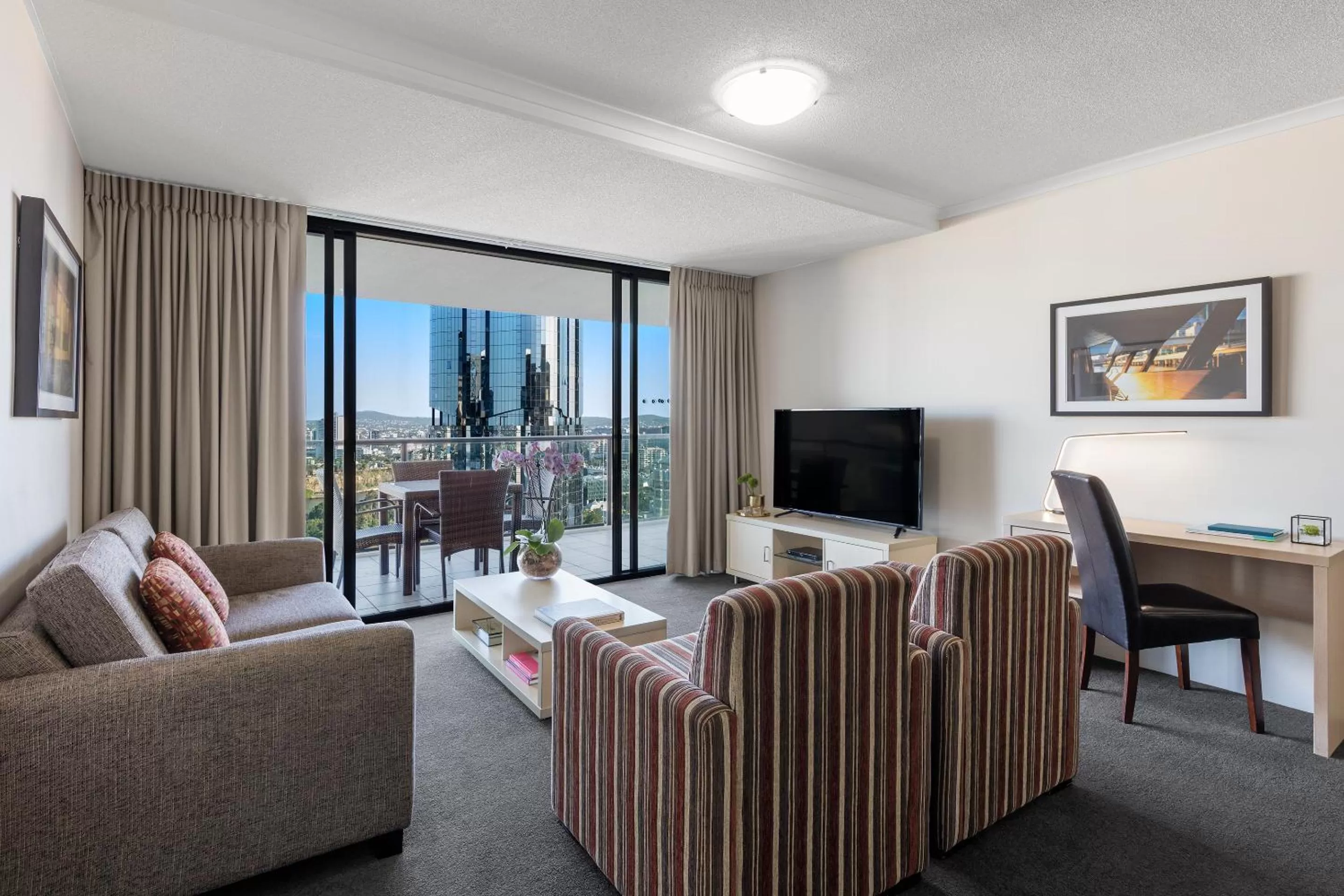 Living room in Oaks Brisbane River City Suites