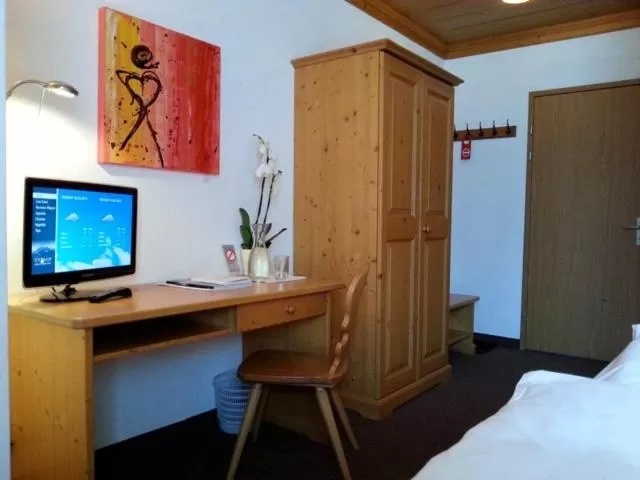 Photo of the whole room, Bed in Sonnegg Hotel