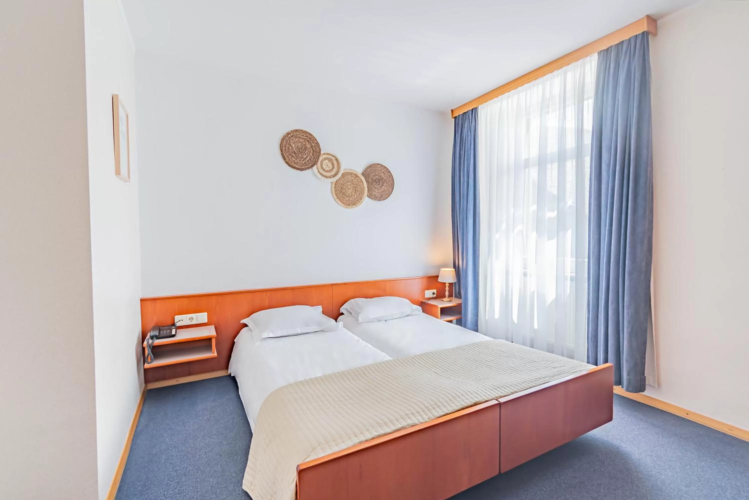 Bed in Hôtel Le Petit Poète