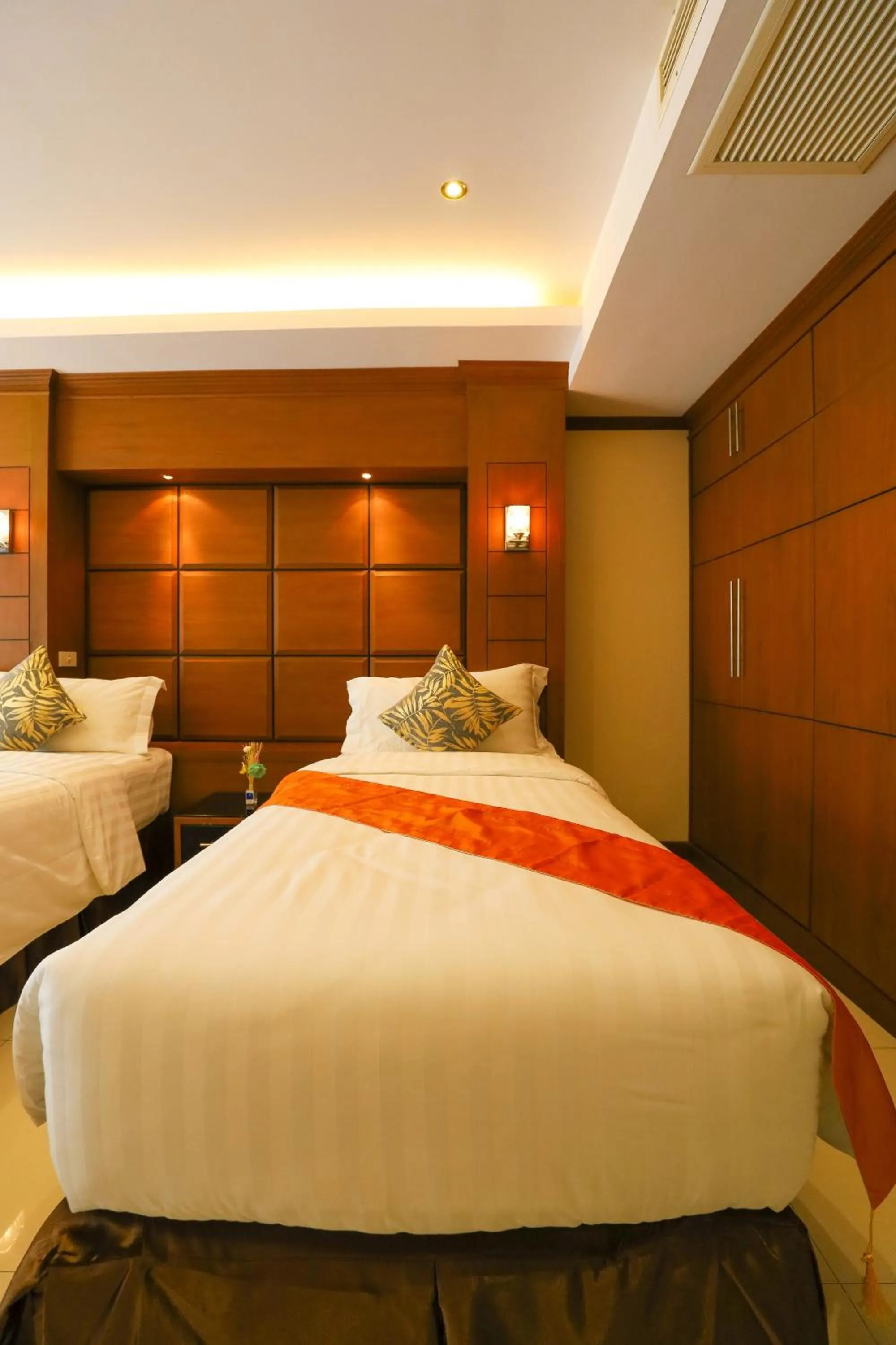 Bed in Tara Court Hotel