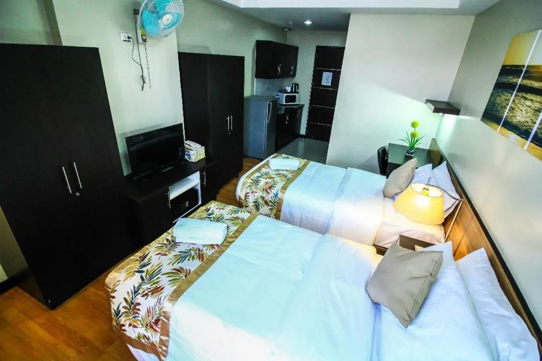 Photo of the whole room, Bed in The Studio 87 Residences