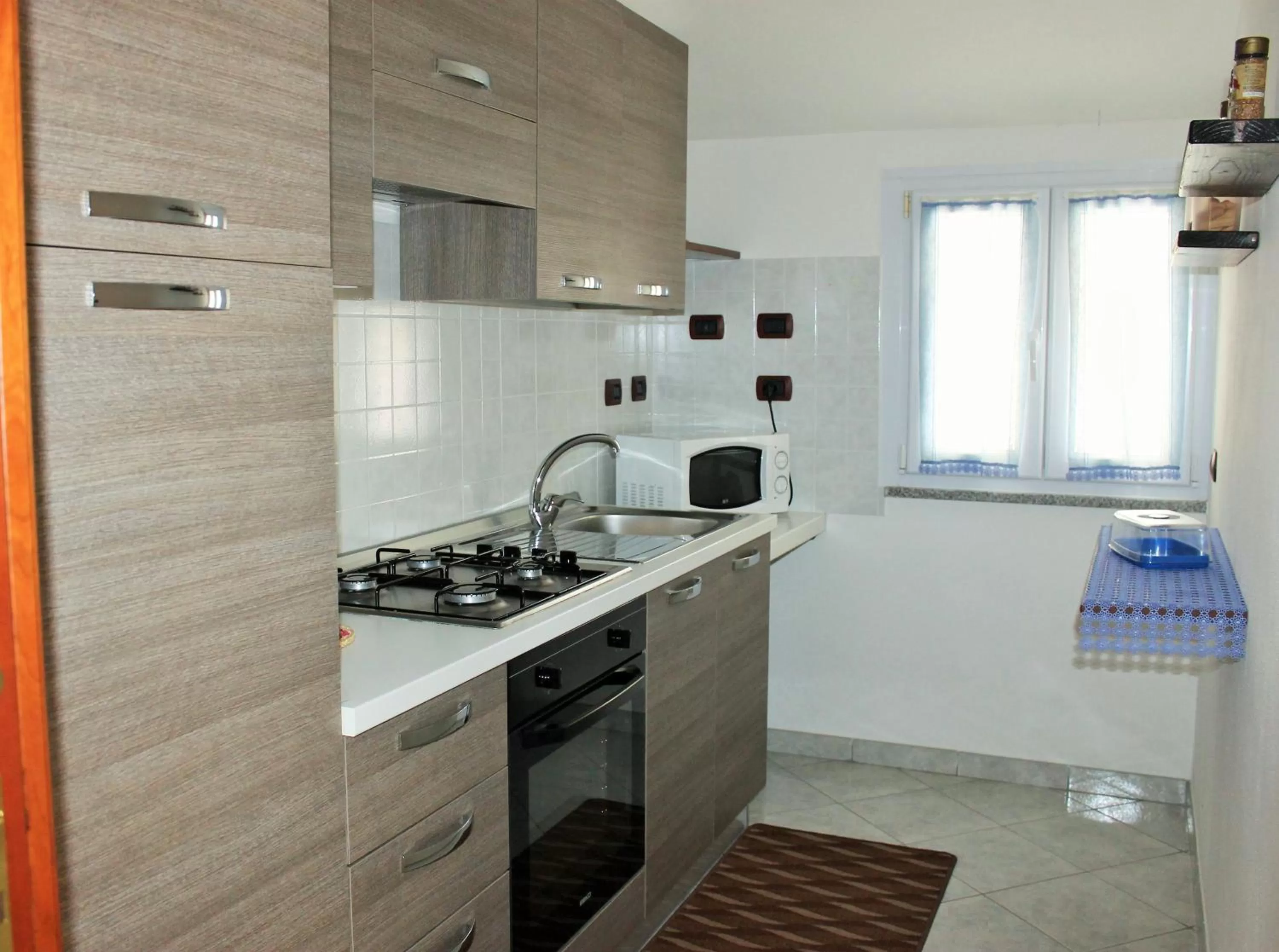 Kitchen or kitchenette in Casa Vacanze Nuraghe Talia