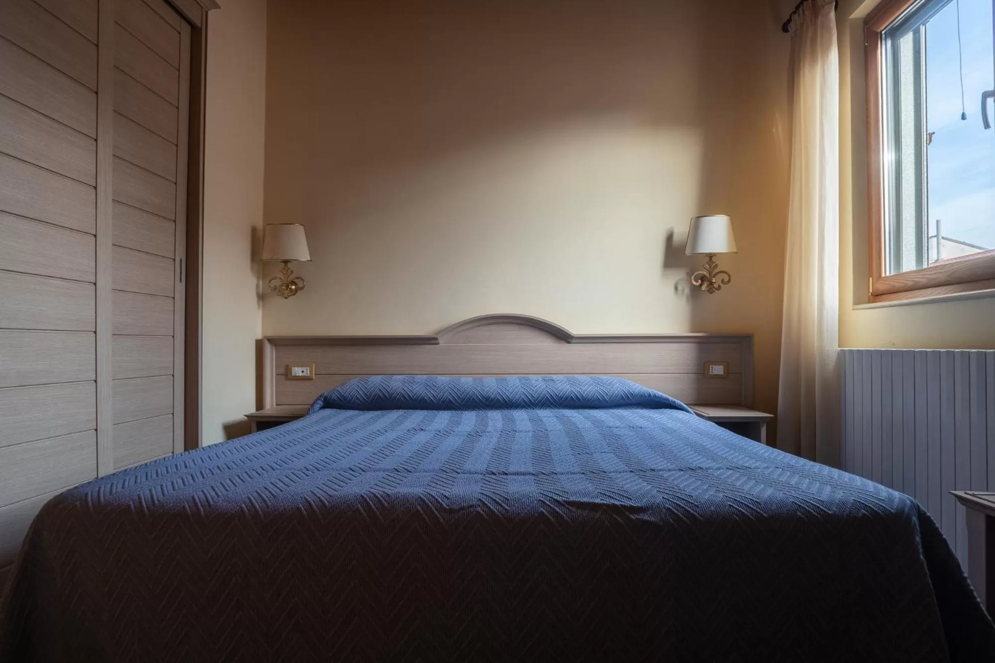 Bed in Hotel Don Giovanni