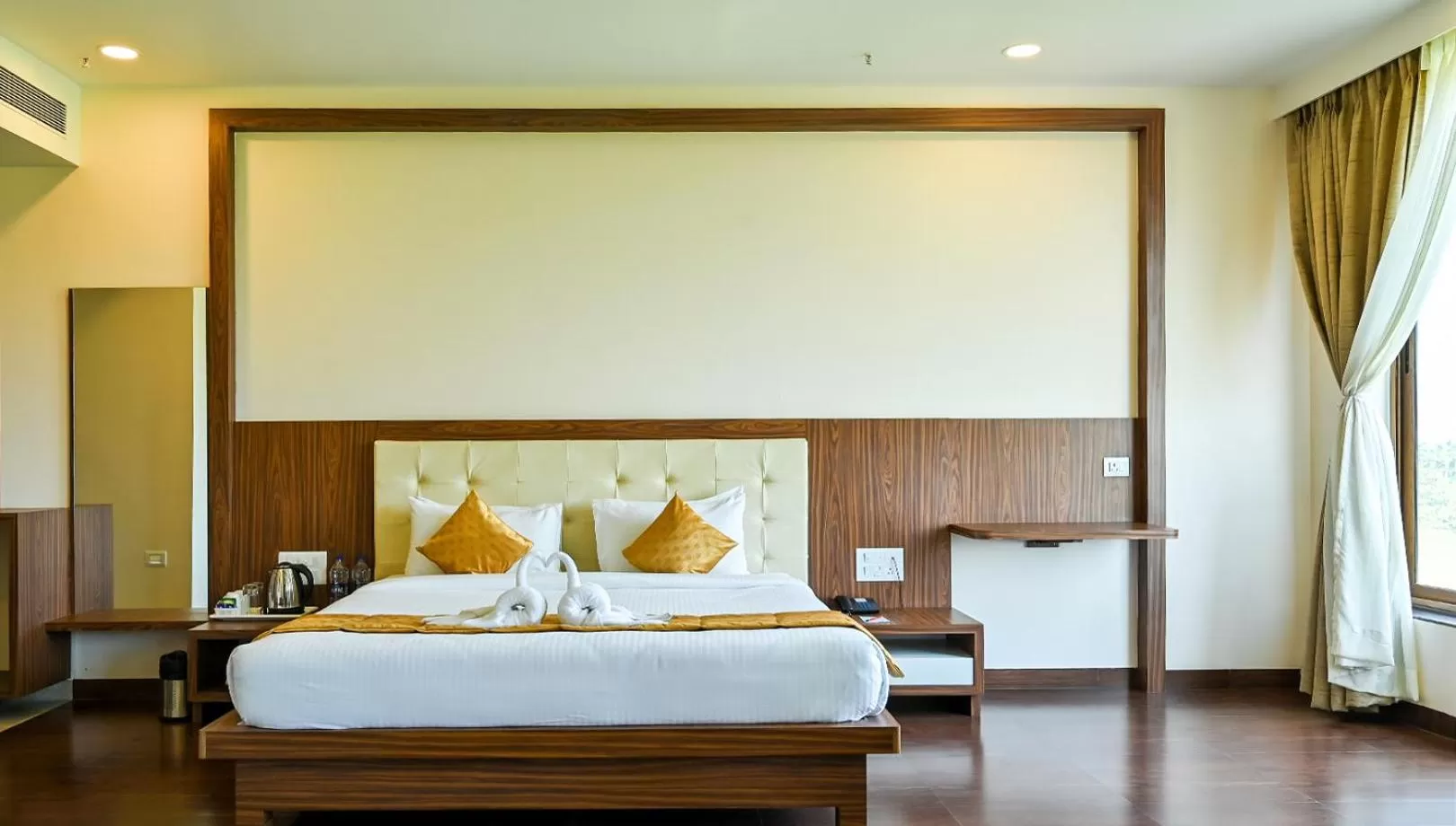 Bed in Hotel Laxmi Empire