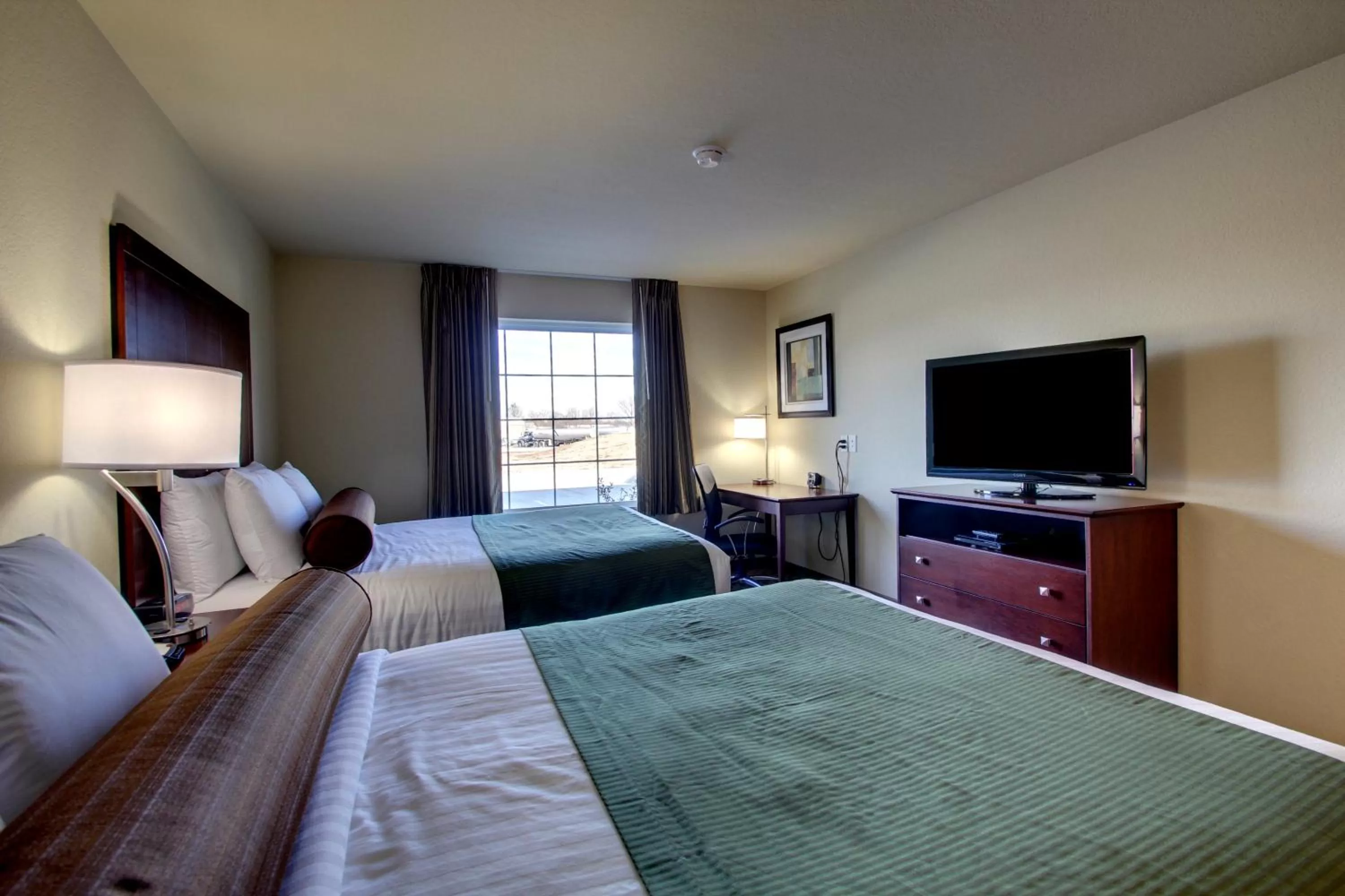 Bed in Cobblestone Inn & Suites - Harvey