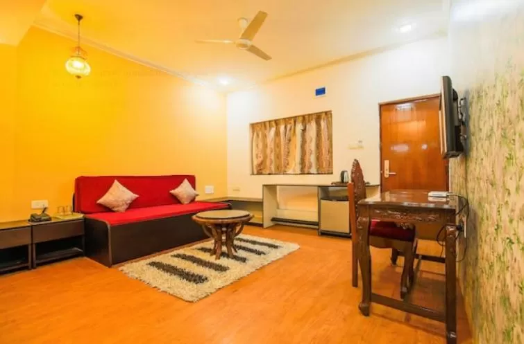 Living room in The Center Court Resort & Spa