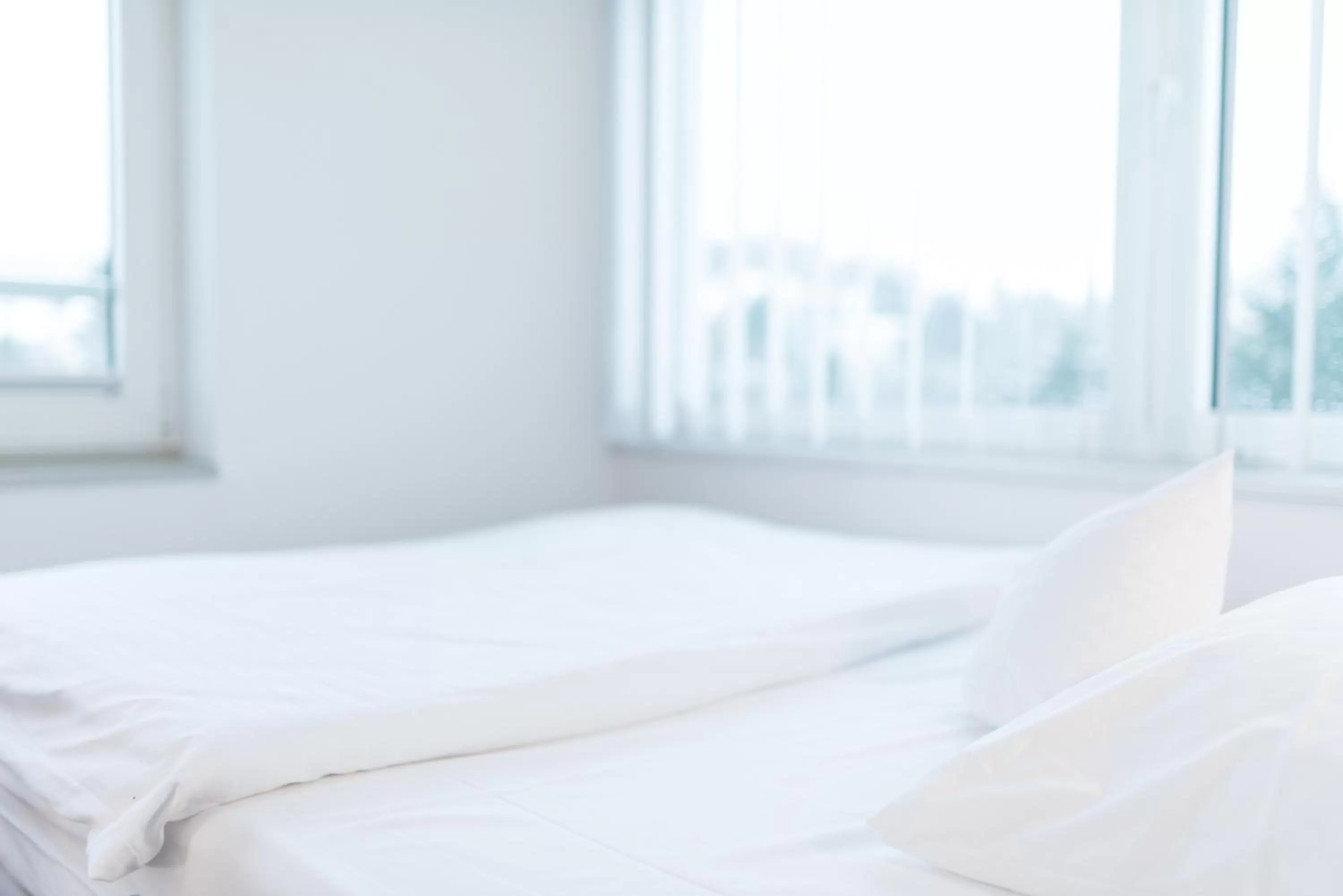 Bed in Hotel Am Triller - Hotel & Serviced Apartments