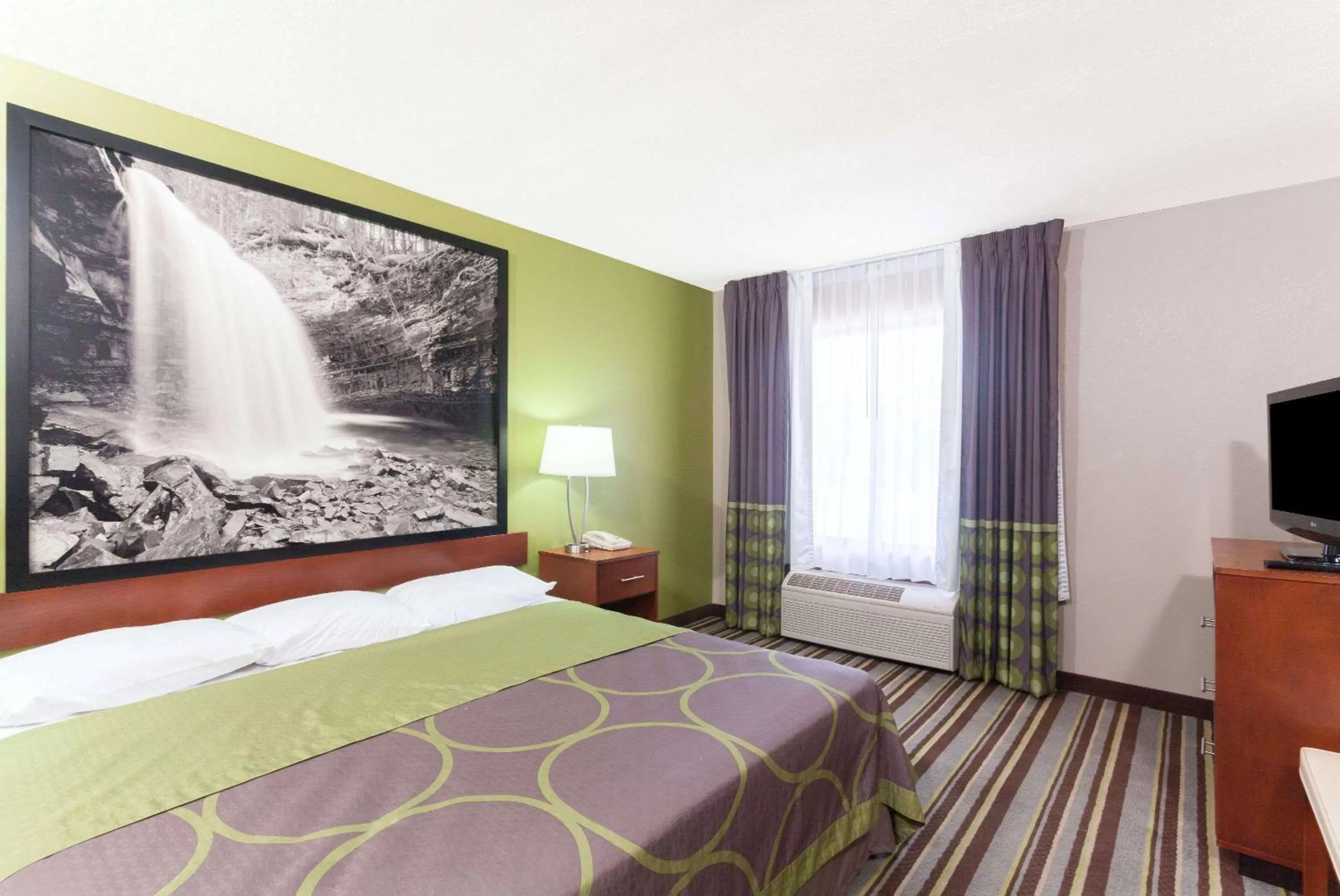 On site, Bed in Super 8 by Wyndham Clarksville Northeast