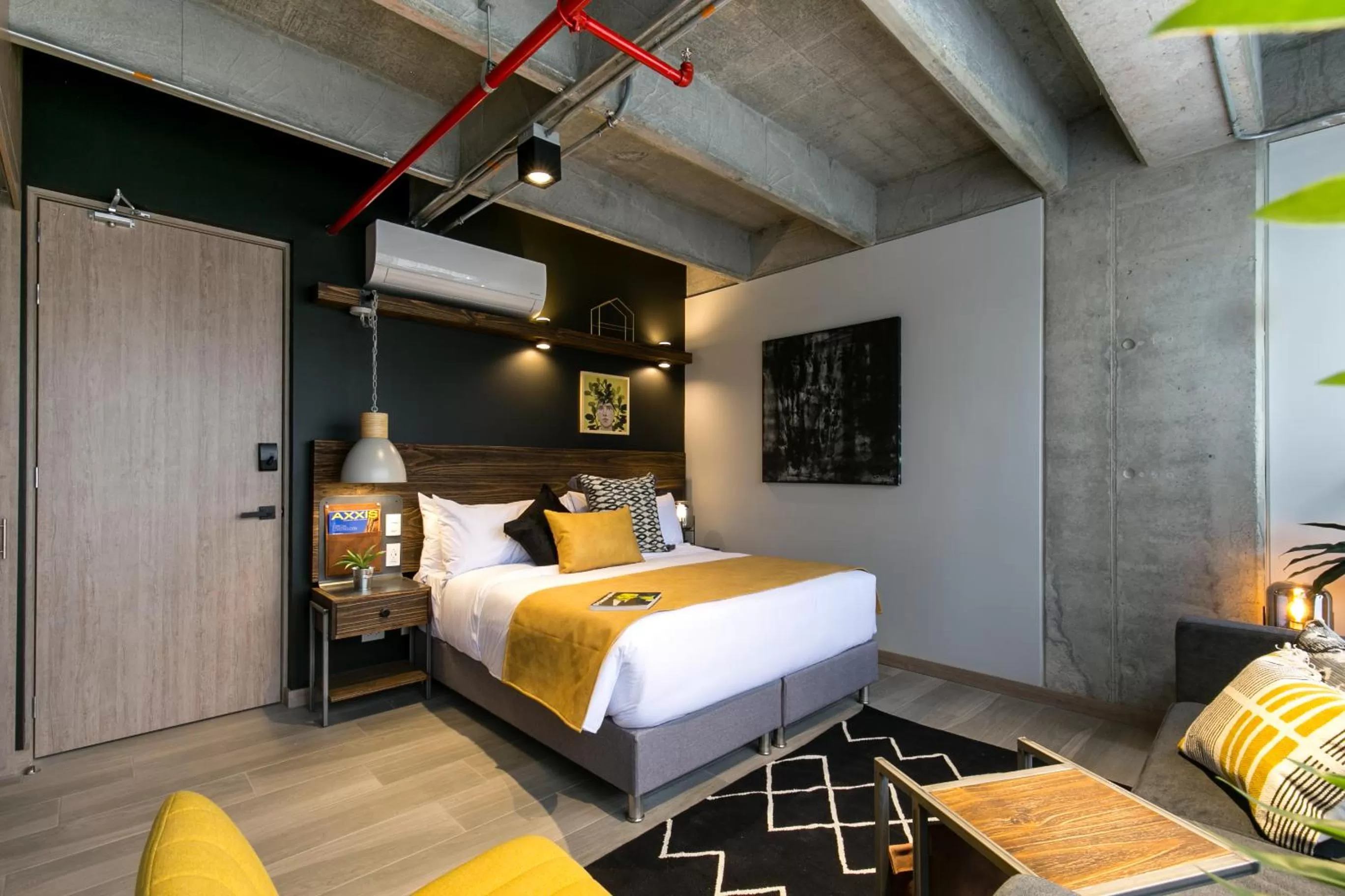 Bed in Factory Lofts Hotel