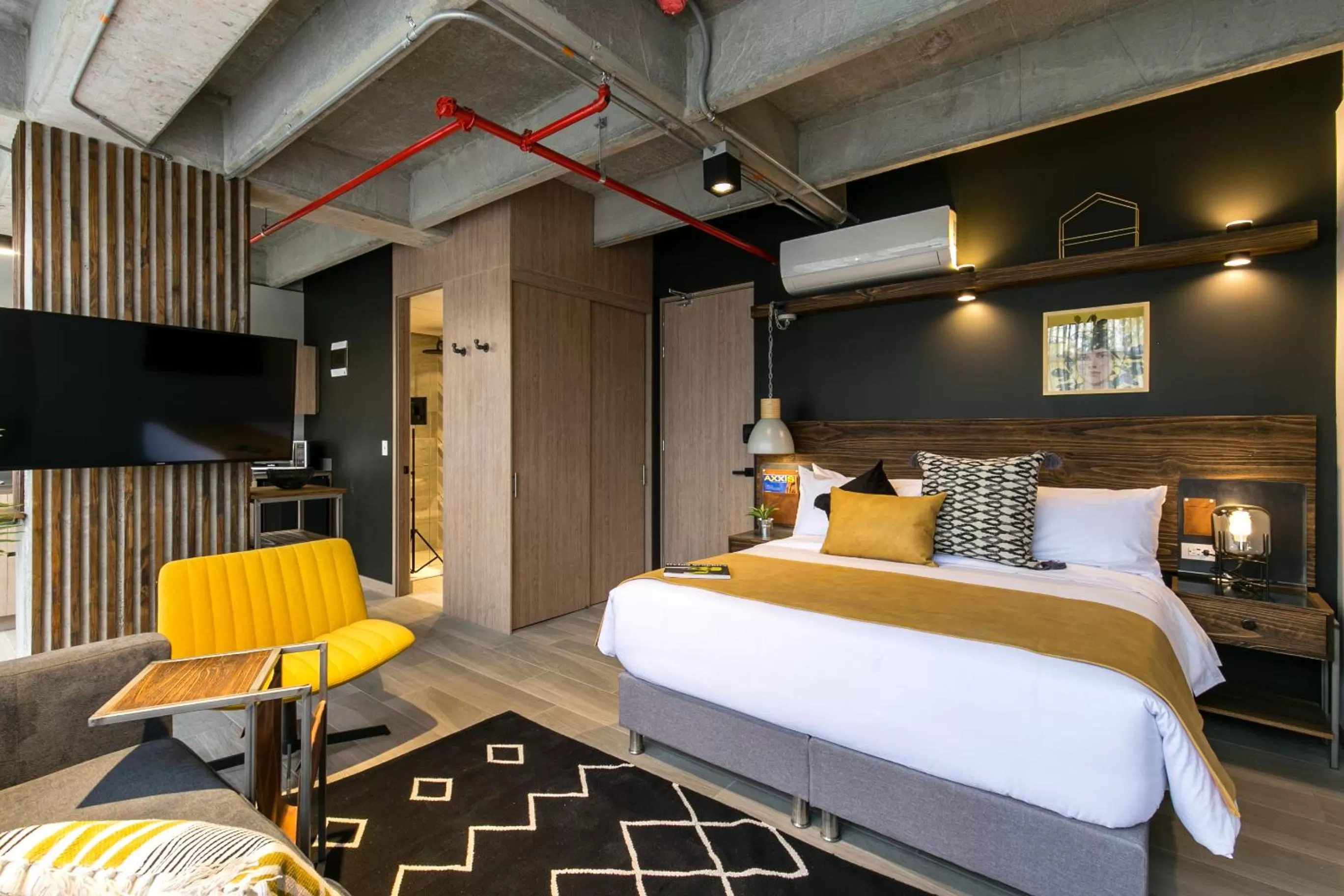 Bed in Factory Lofts Hotel