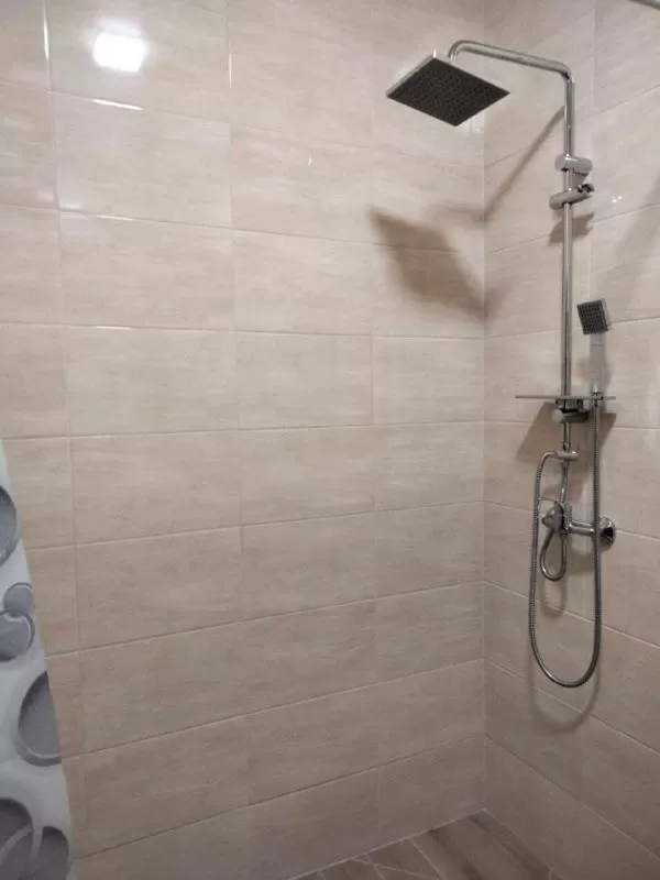 Bathroom in Hotel Prydesnyansky