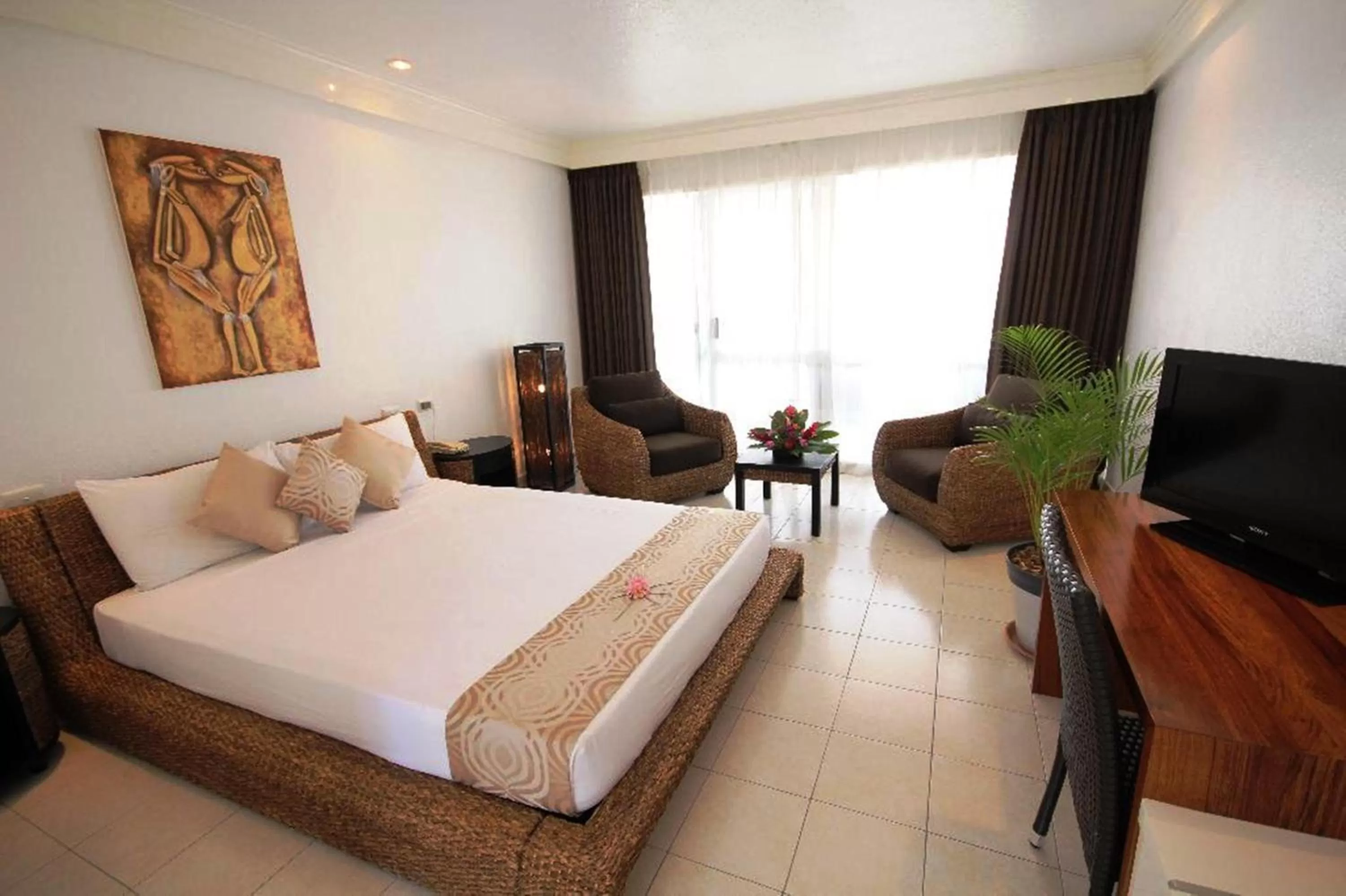 Photo of the whole room, Bed in The Melanesian Port Vila