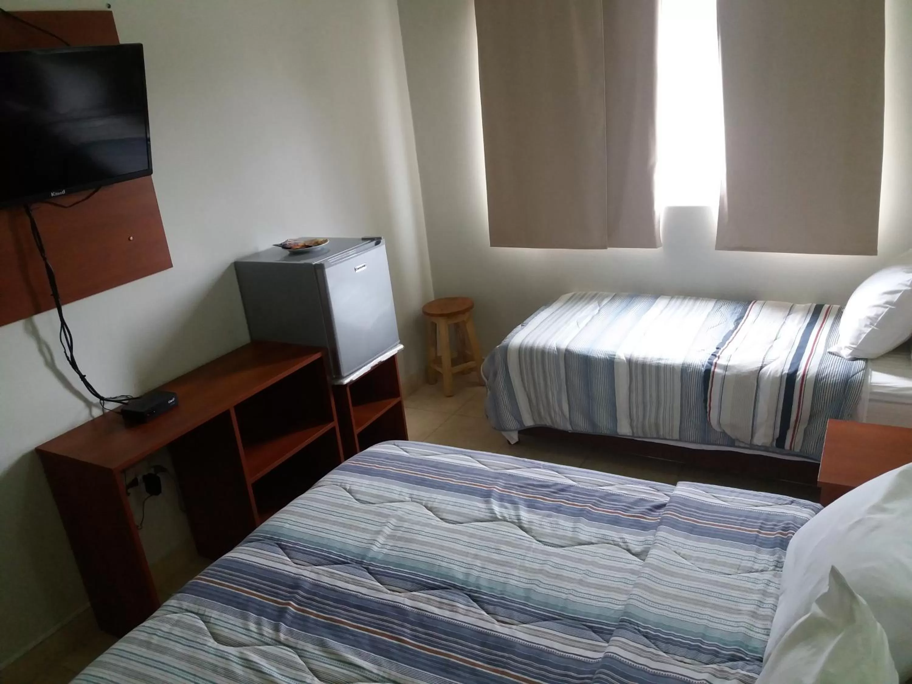 Bed in Madame Lynch Hotel Boutique