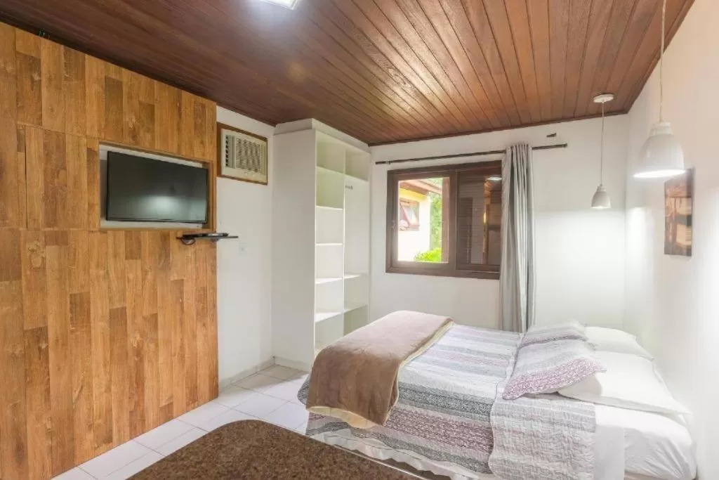 Bed in Pousada Bangalôs Da Mole - Florianópolis