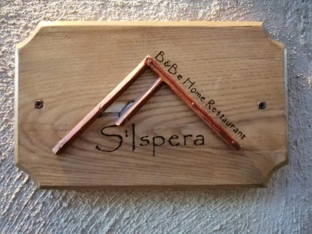 Property logo or sign in B&B e Home Restaurant S'ispera Monolocale uso esclusivo