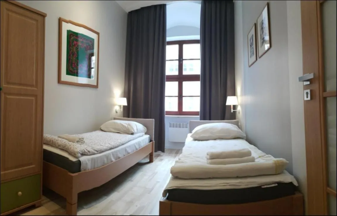 Bed in P&J Apartments Floriańska