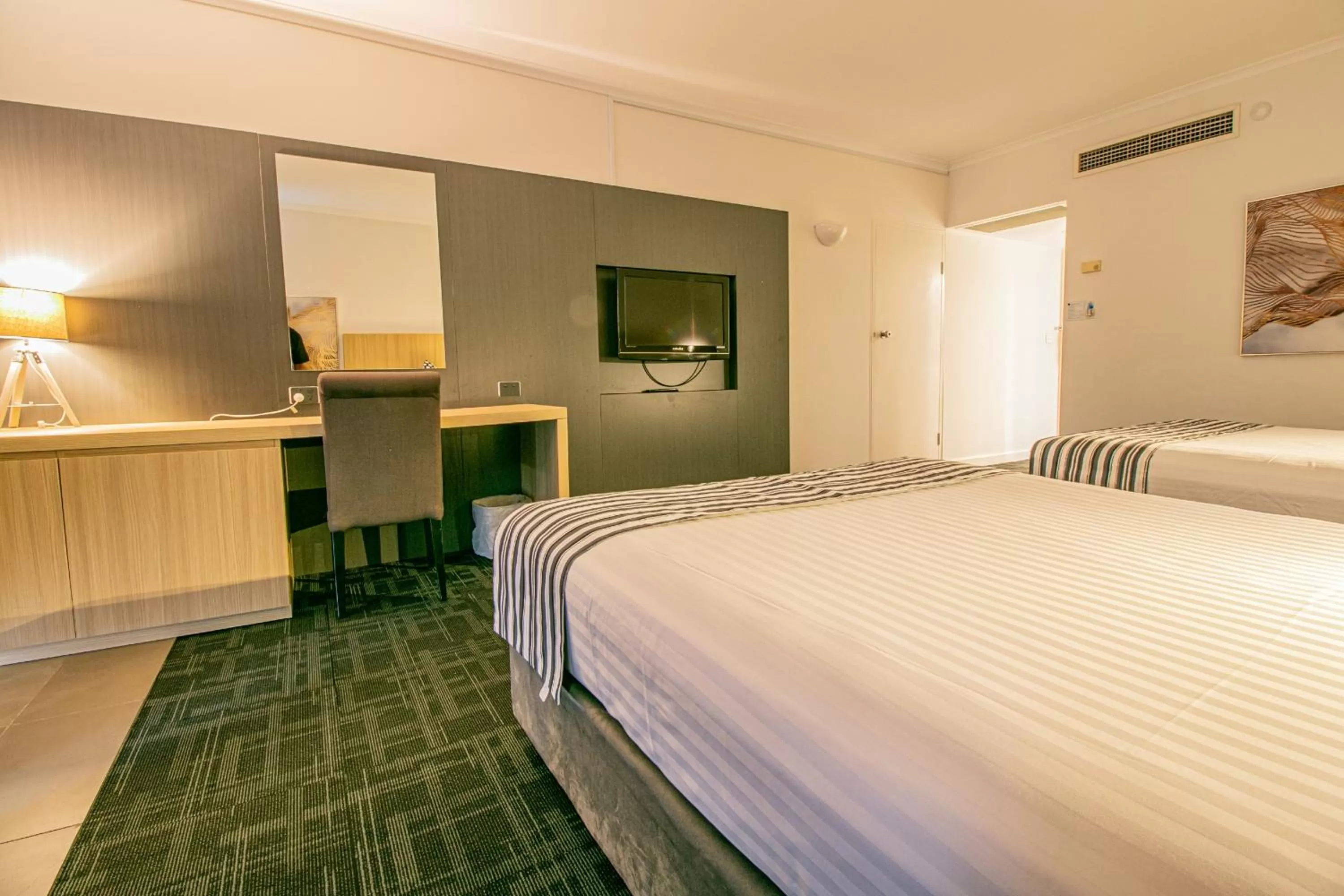 Bed in Absolute Beachfront Opal Cove Resort