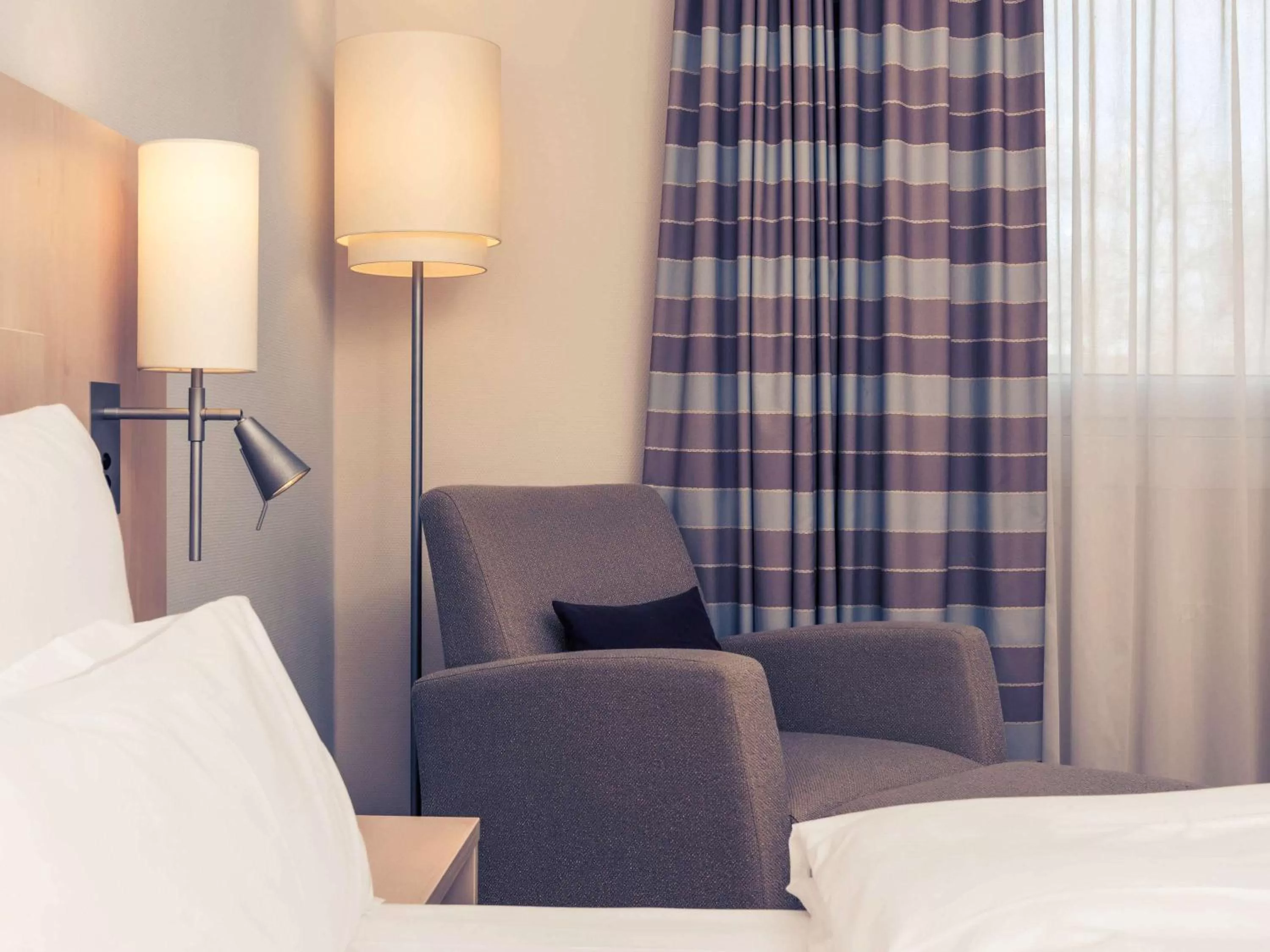 Photo of the whole room, Bed in Mercure Hotel Mannheim am Friedensplatz