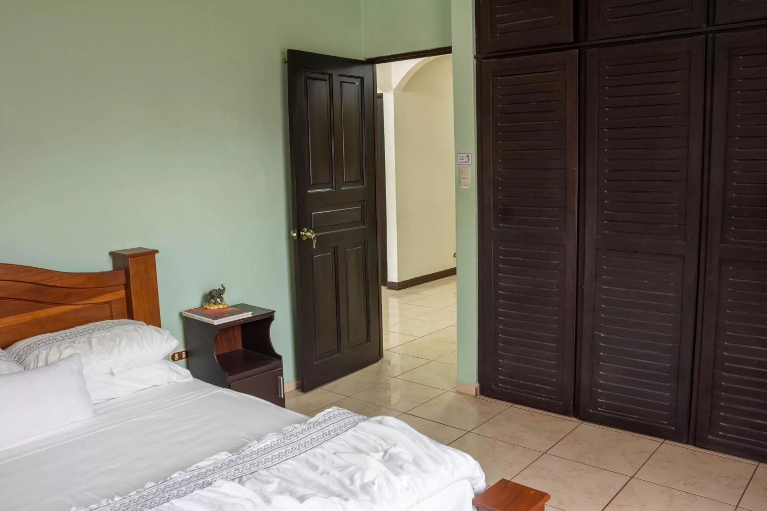 Bed in Tico House Bed & Breakfast