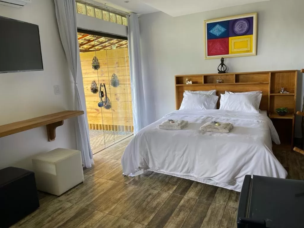 Bed in Pousada R.N.C. Nosso Paraíso