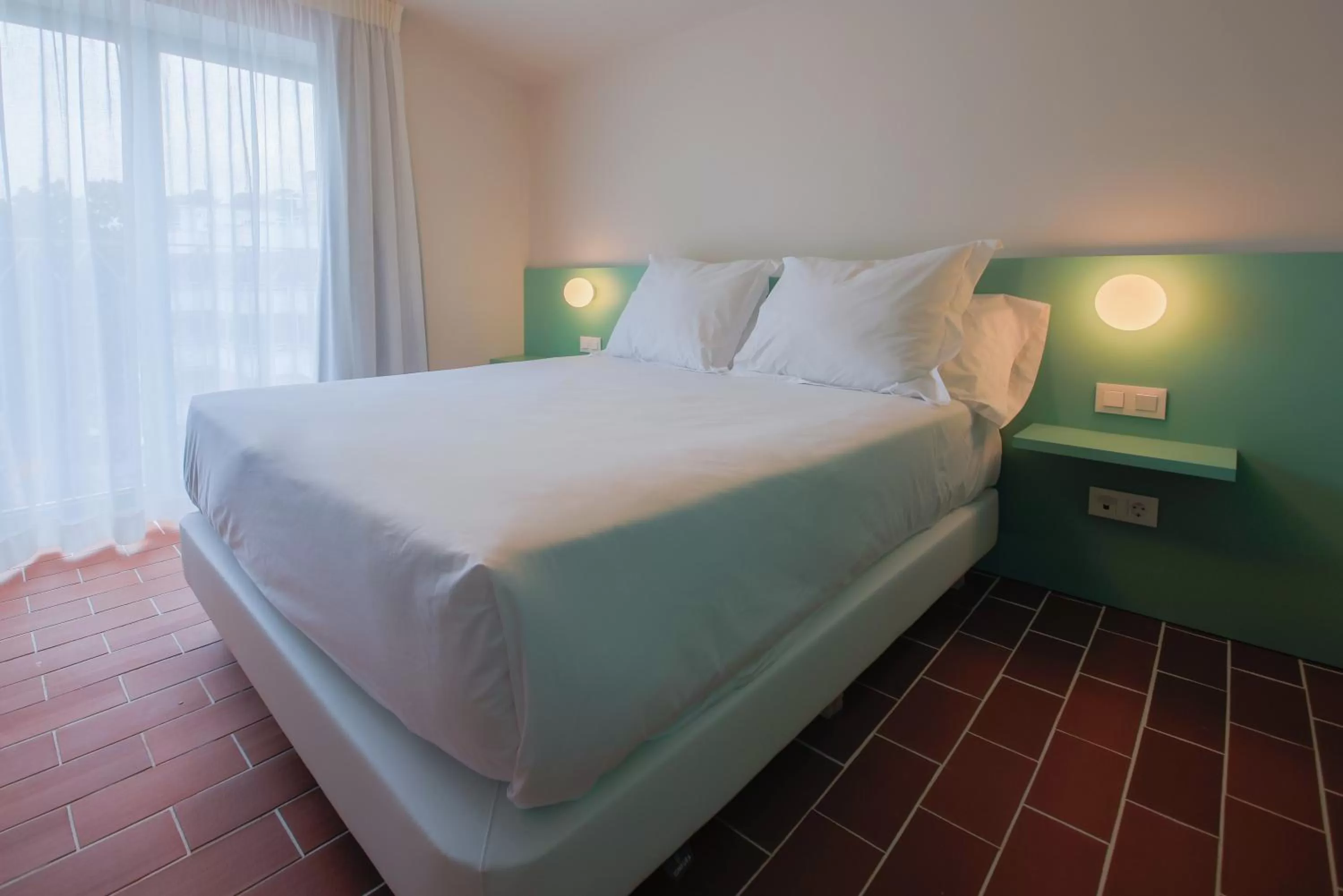 Bed in Terra Aurea Aparthotel