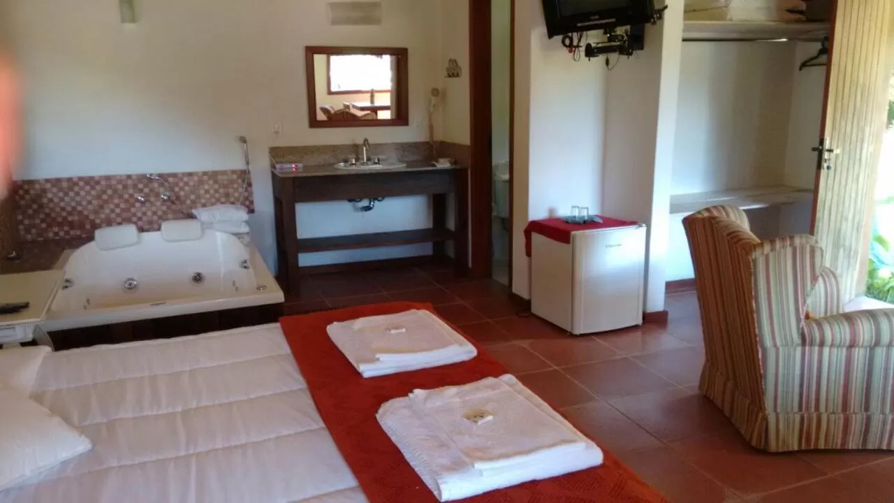 Bed in Pousada Mariza