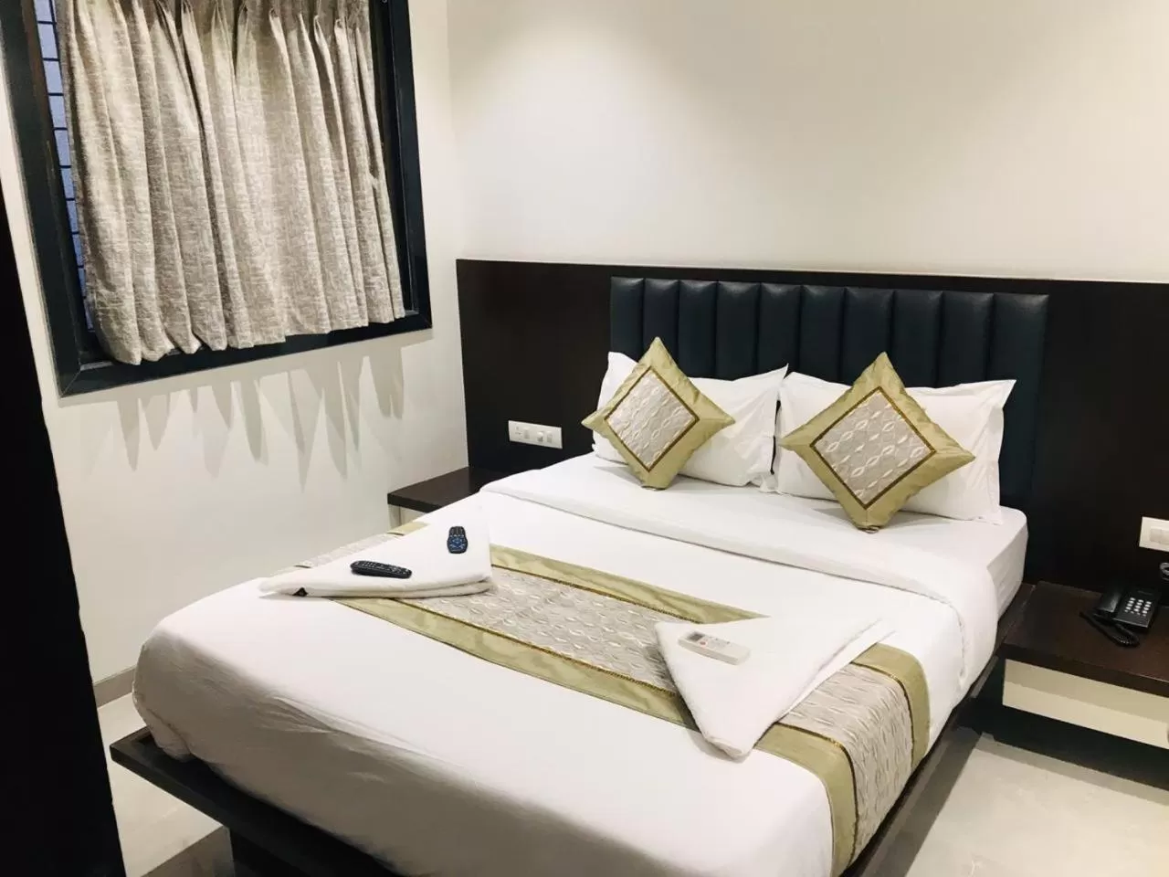 Bed in Hotel Flora Suites - Fort