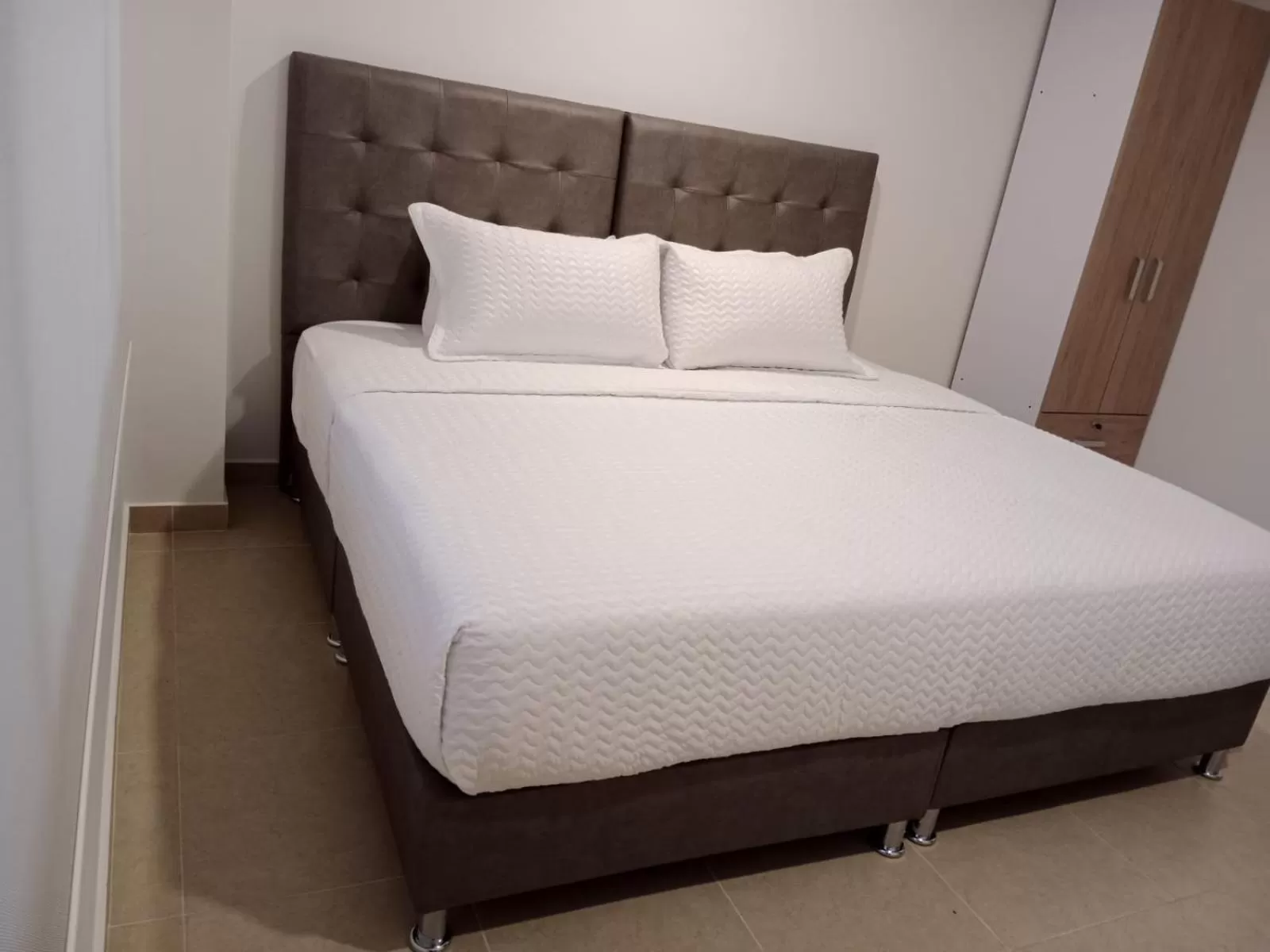 Bed in Aparta Suite Plaza Premium by Tourism Yossa