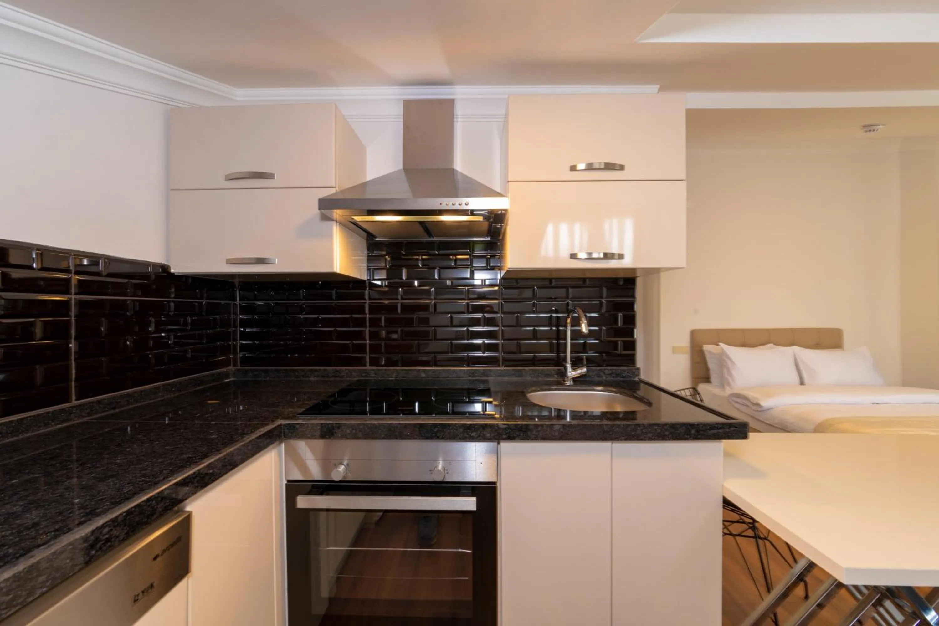 Kitchen or kitchenette in Joy Suites