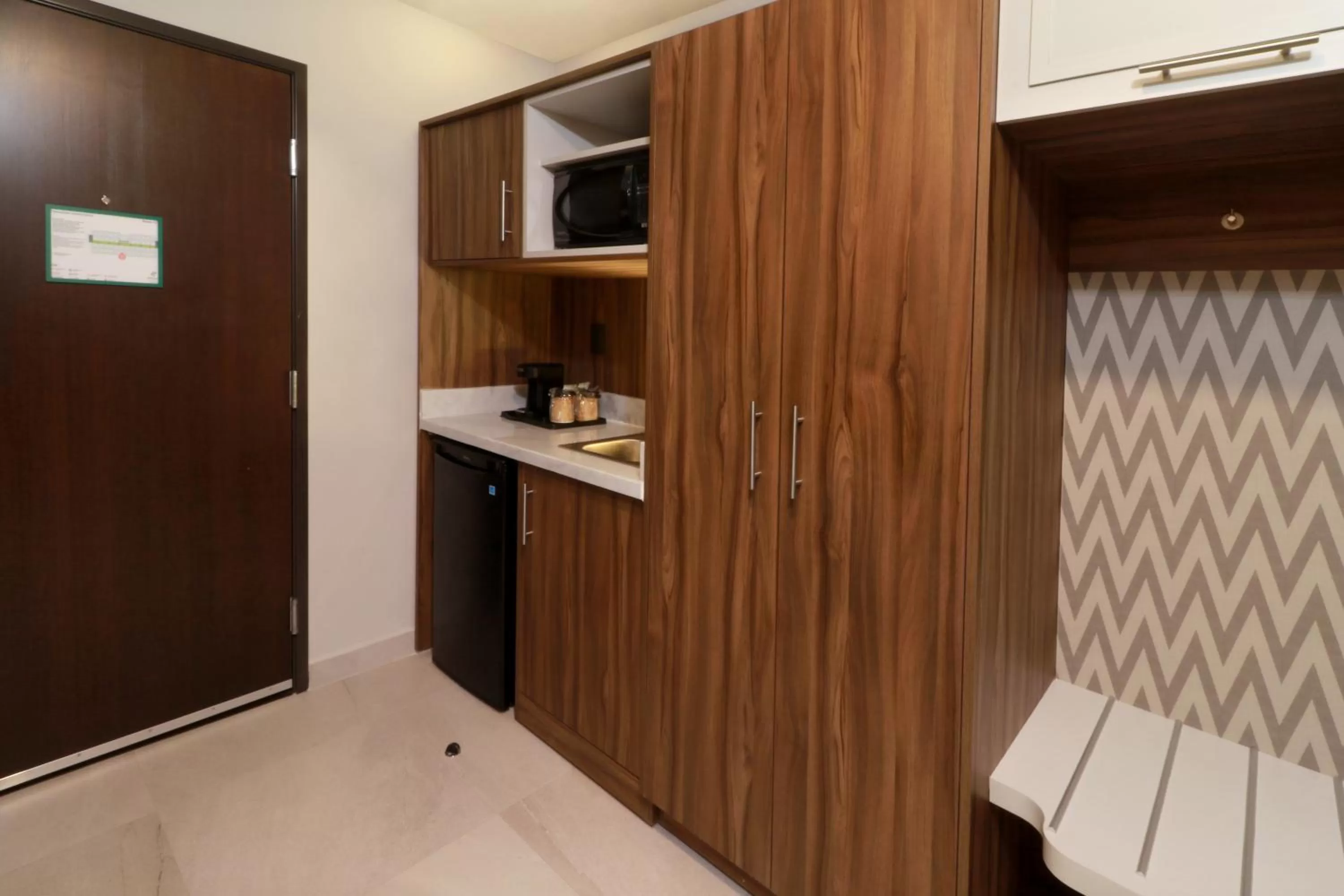 kitchen in Holiday Inn & Suites Monterrey Apodaca Zona Airport, an IHG hotel