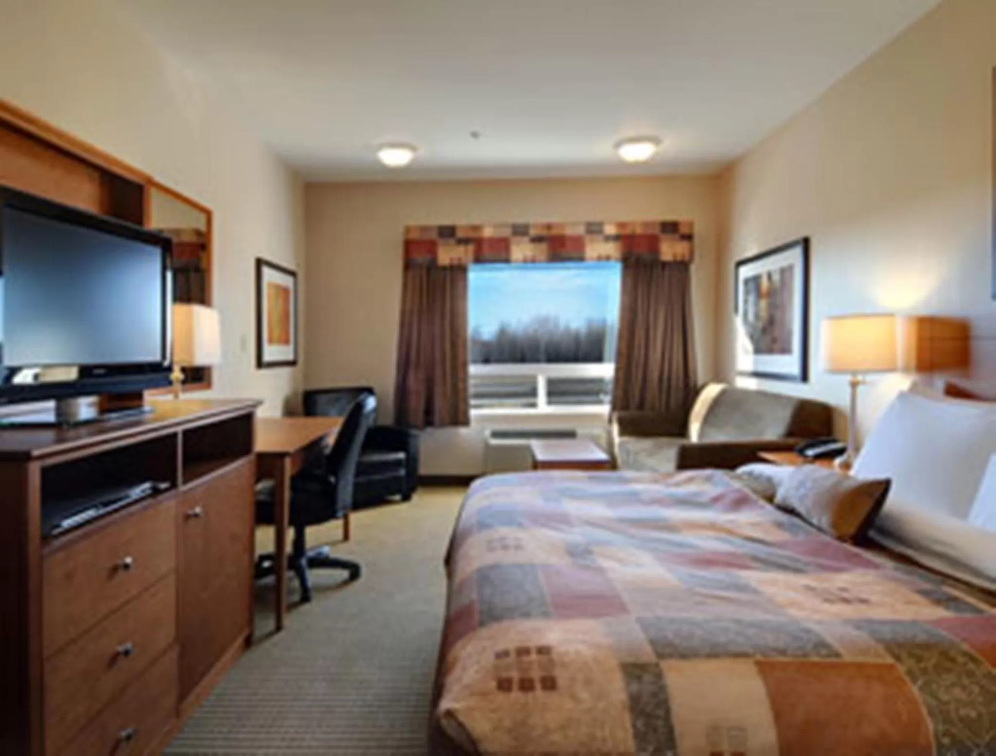 Bed in Ramada by Wyndham Weyburn