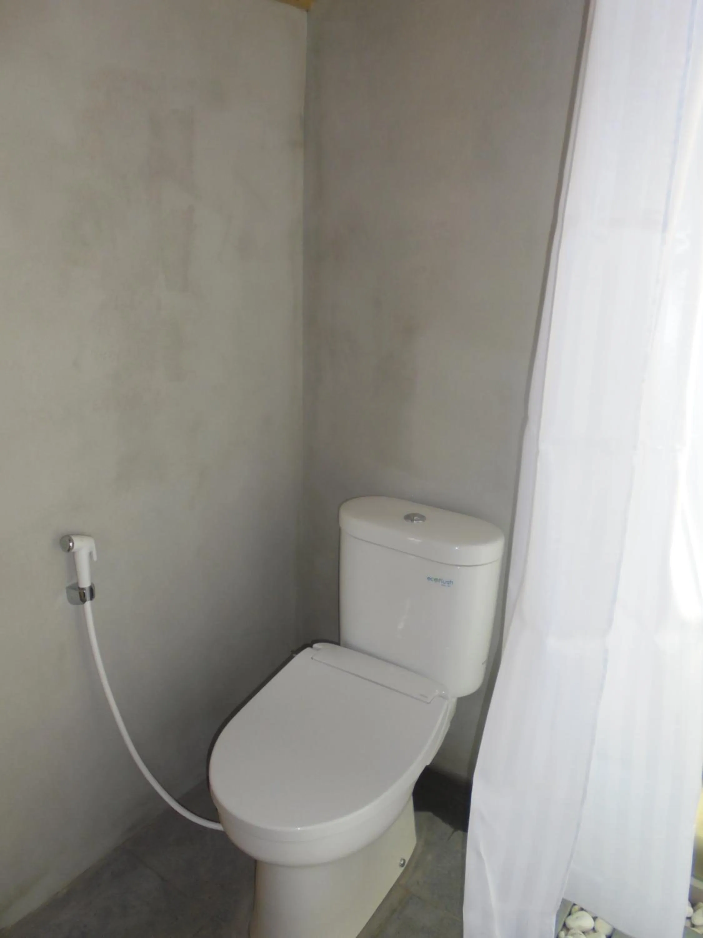 Toilet in Biyukukung Suite & Spa