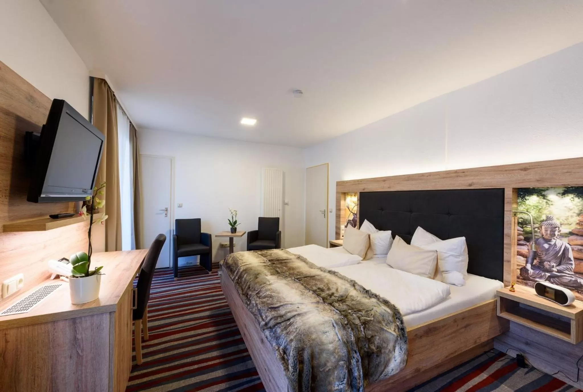 Photo of the whole room, TV/Entertainment Center in Wellness & Ayurveda Hotel Am Eichenberg