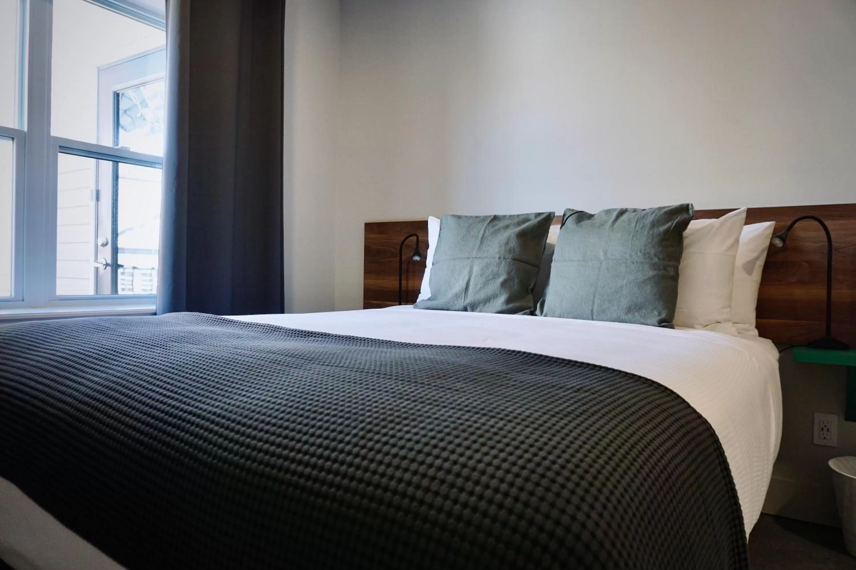 Bed in Morel Executive Suites