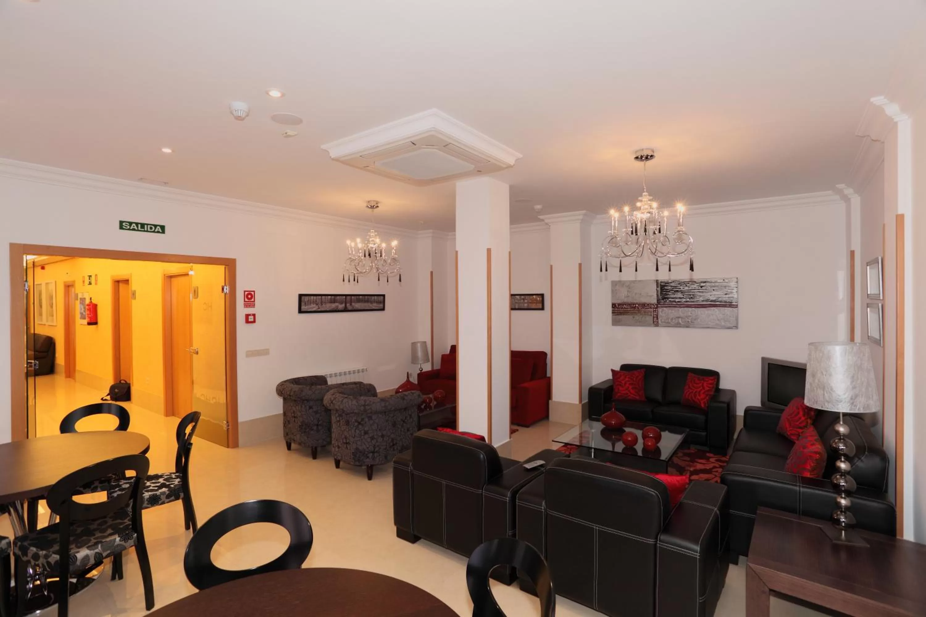 Communal lounge/ TV room in Hotel HC Sigüenza