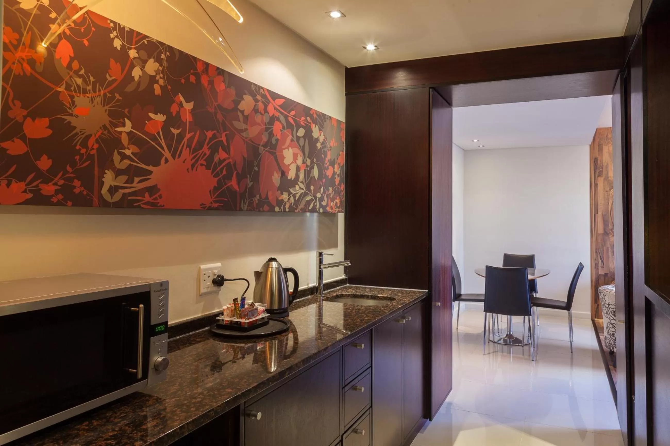 Kitchen or kitchenette in Colosseum Hotel