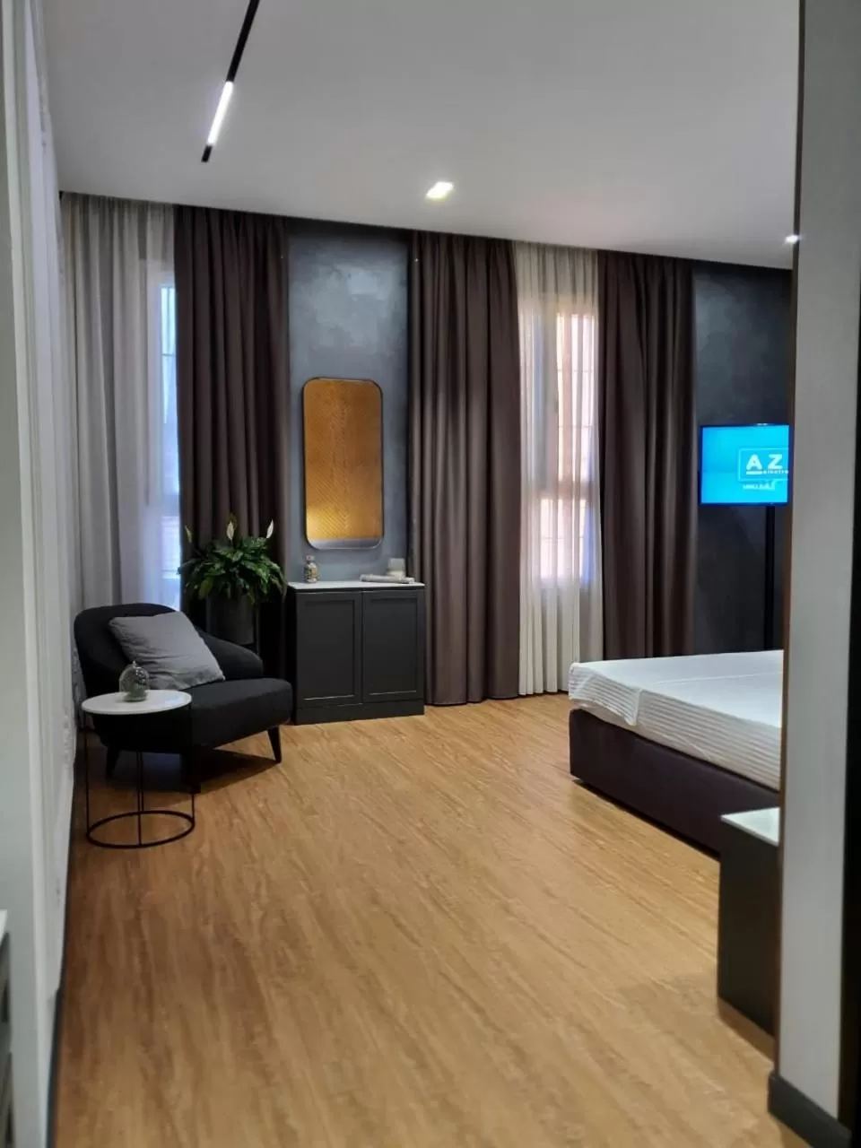 Seating area, TV/Entertainment Center in Hotel Europa