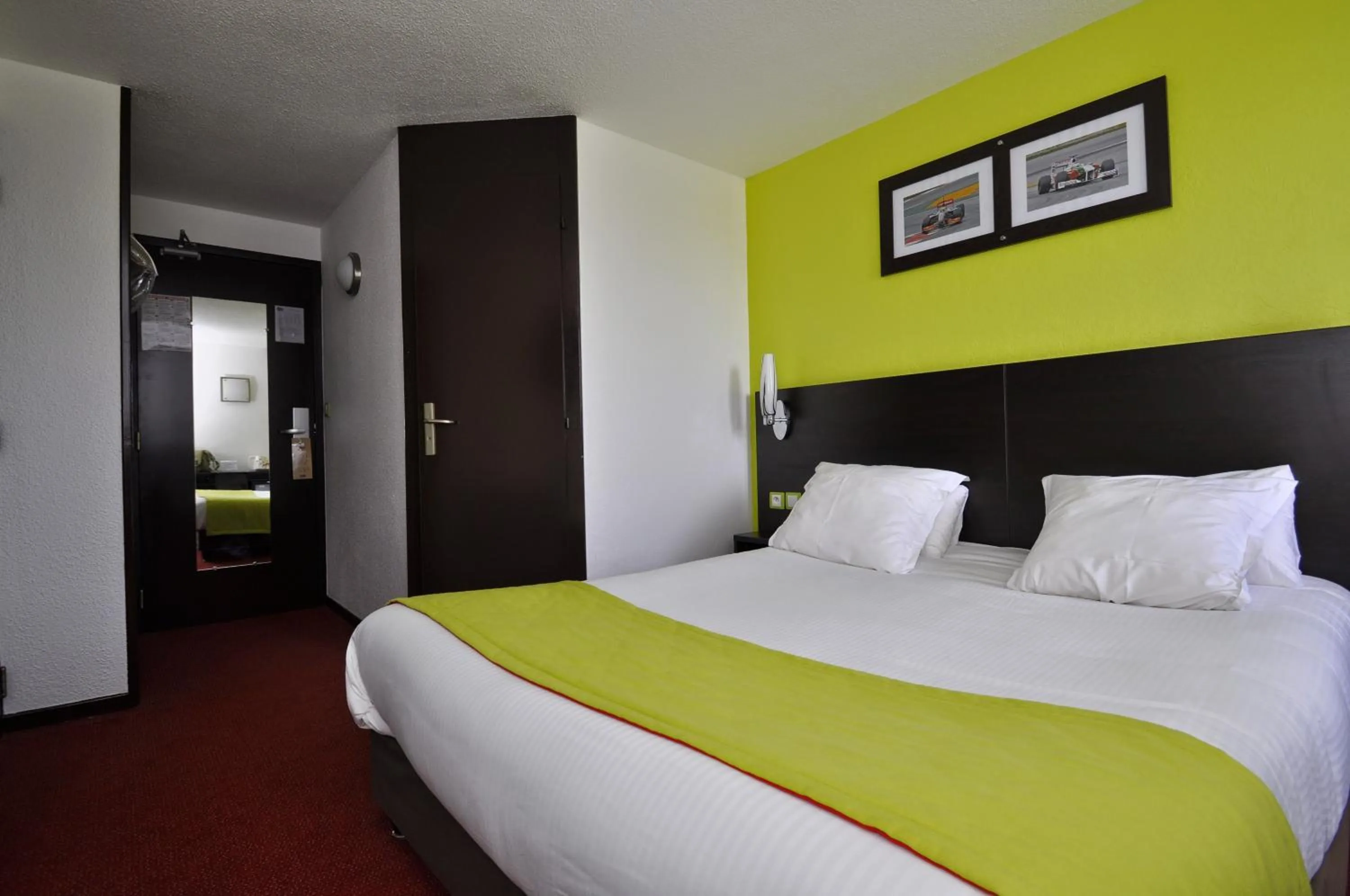 Bed in Enzo Hotels Vierzon by Kyriad Direct