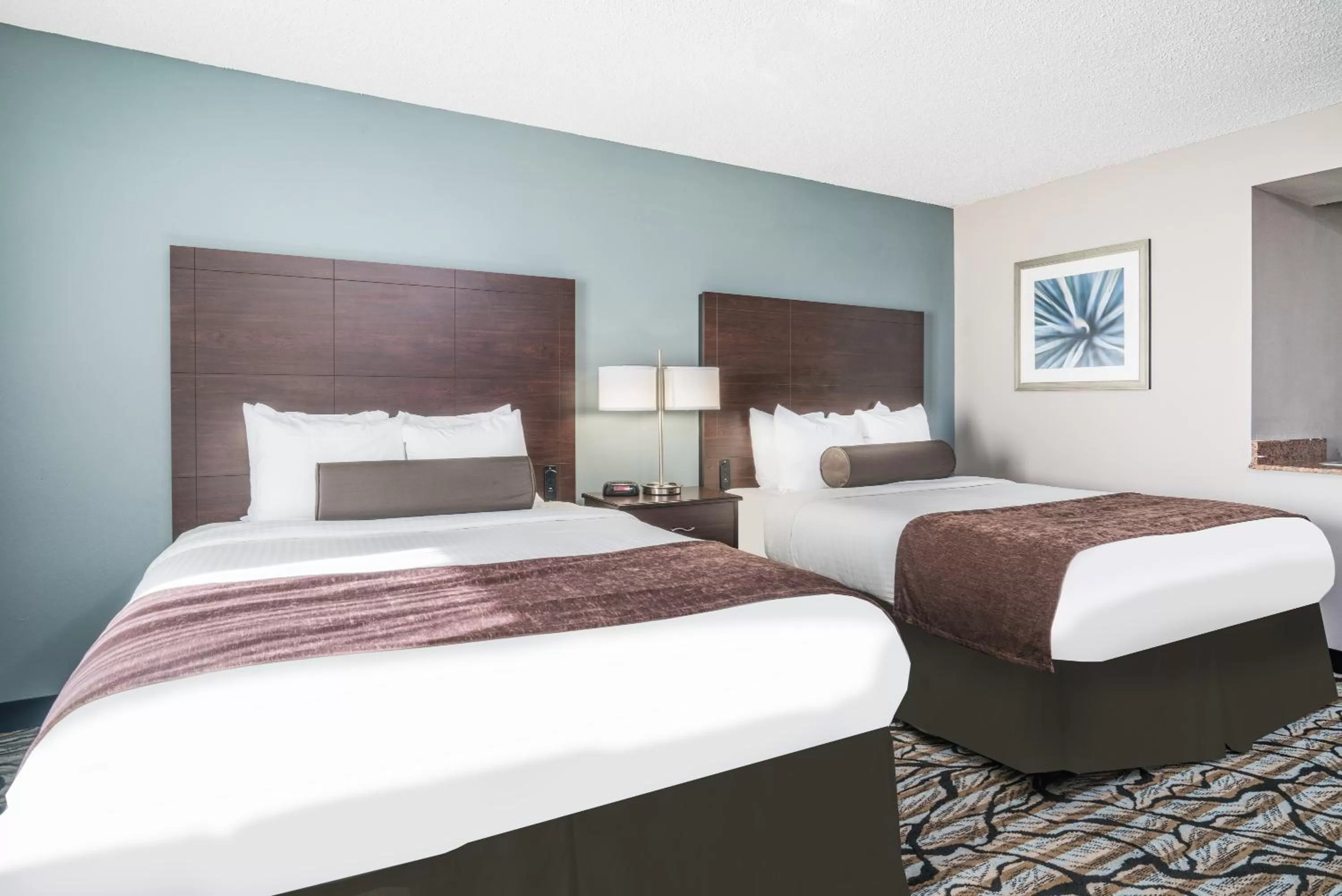 Bed in Days Inn & Suites by Wyndham Wausau