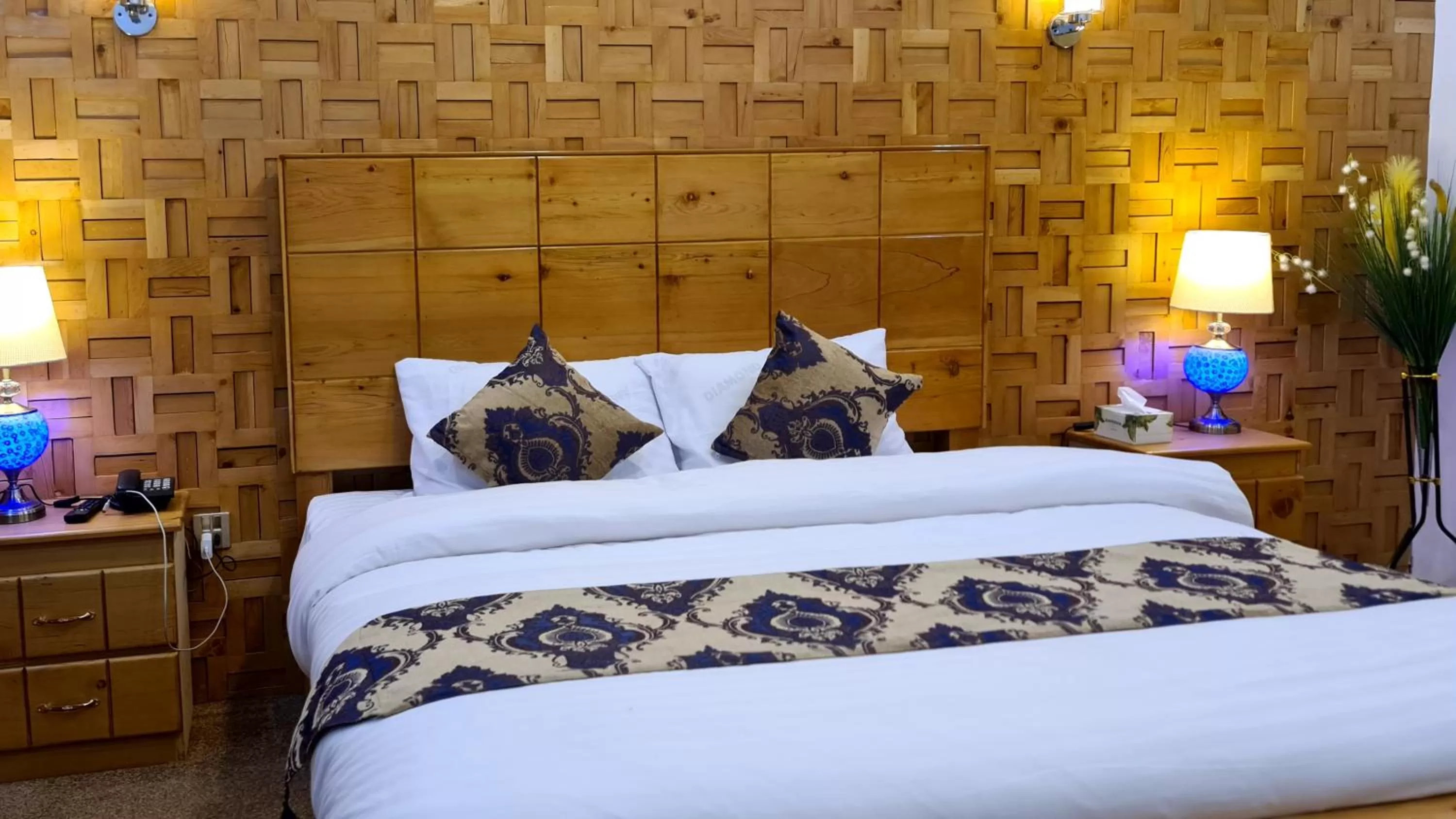 Bed in Indus Lodges Gilgit