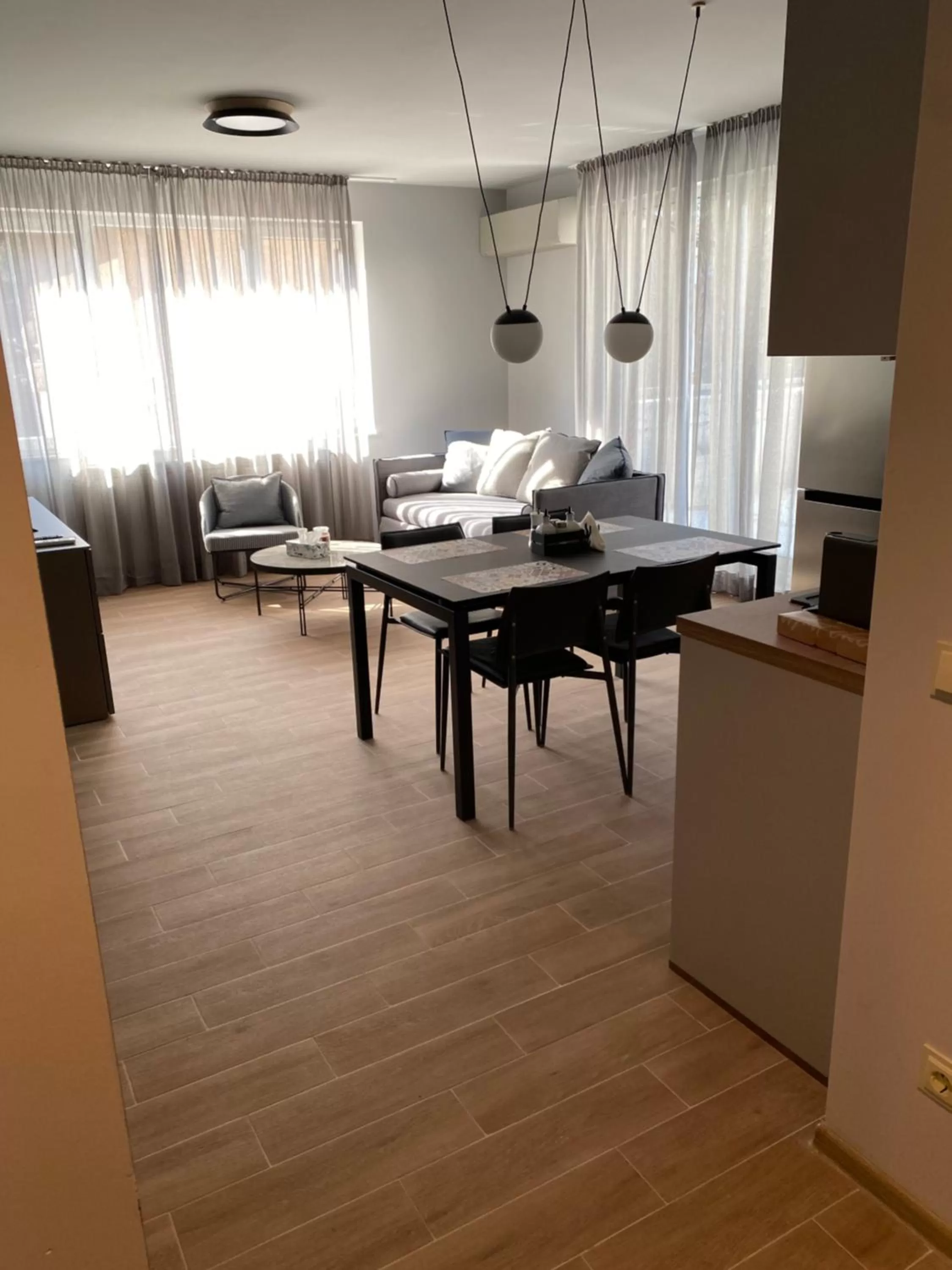 Bed, Dining Area in 7th Sense boutique apartments