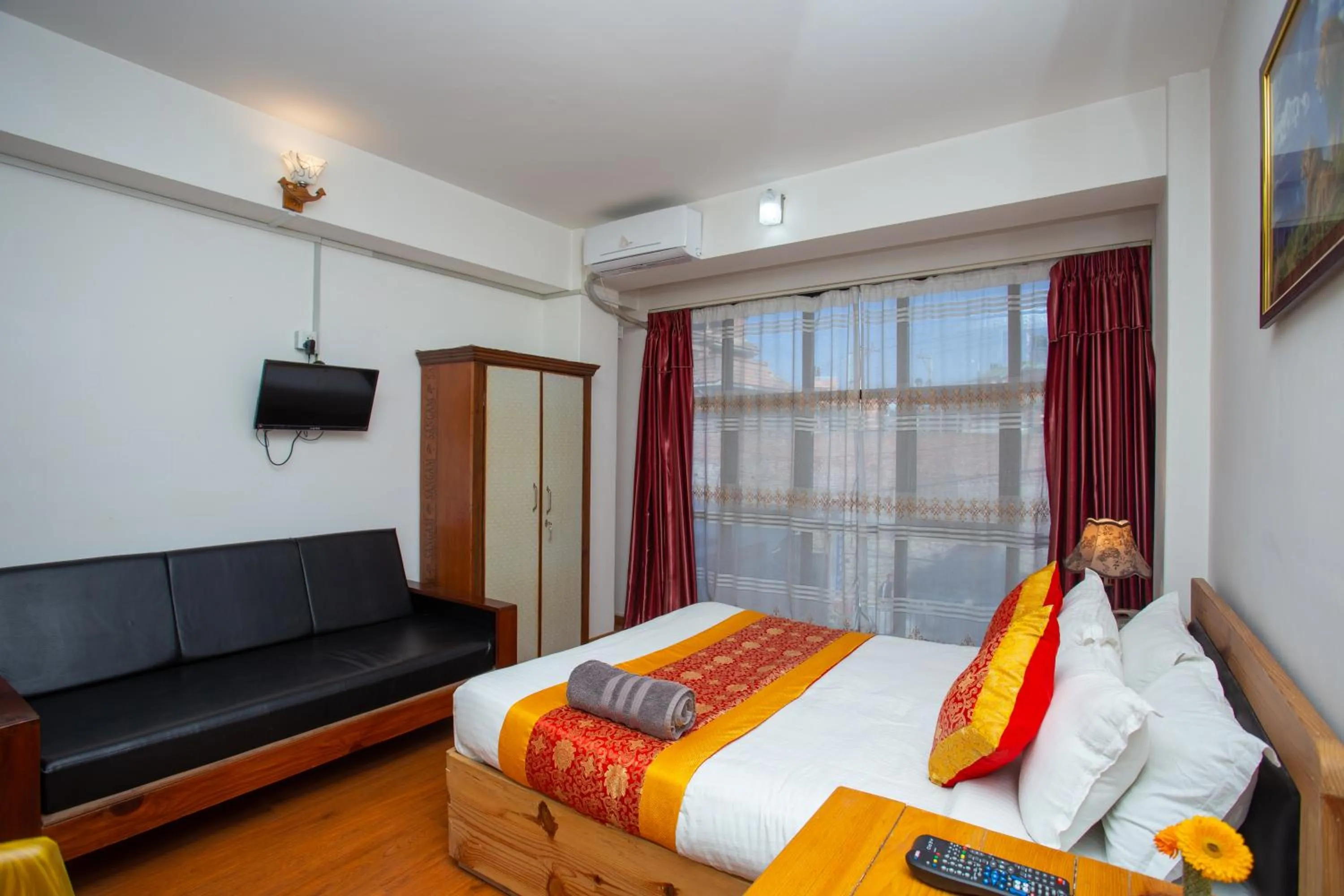 Photo of the whole room, Bed in The Boudha Inn