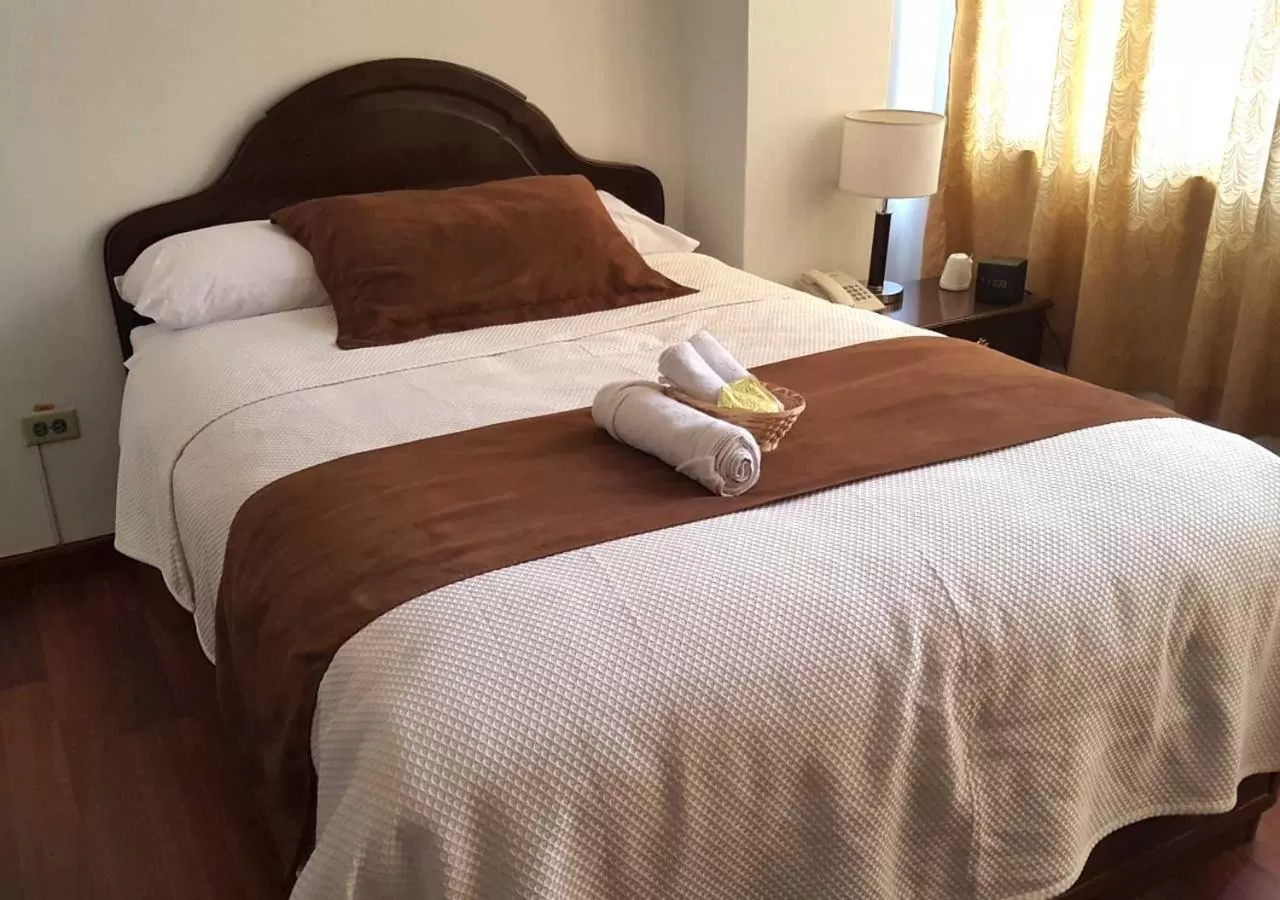 Photo of the whole room, Bed in La Merced Plaza Hostal