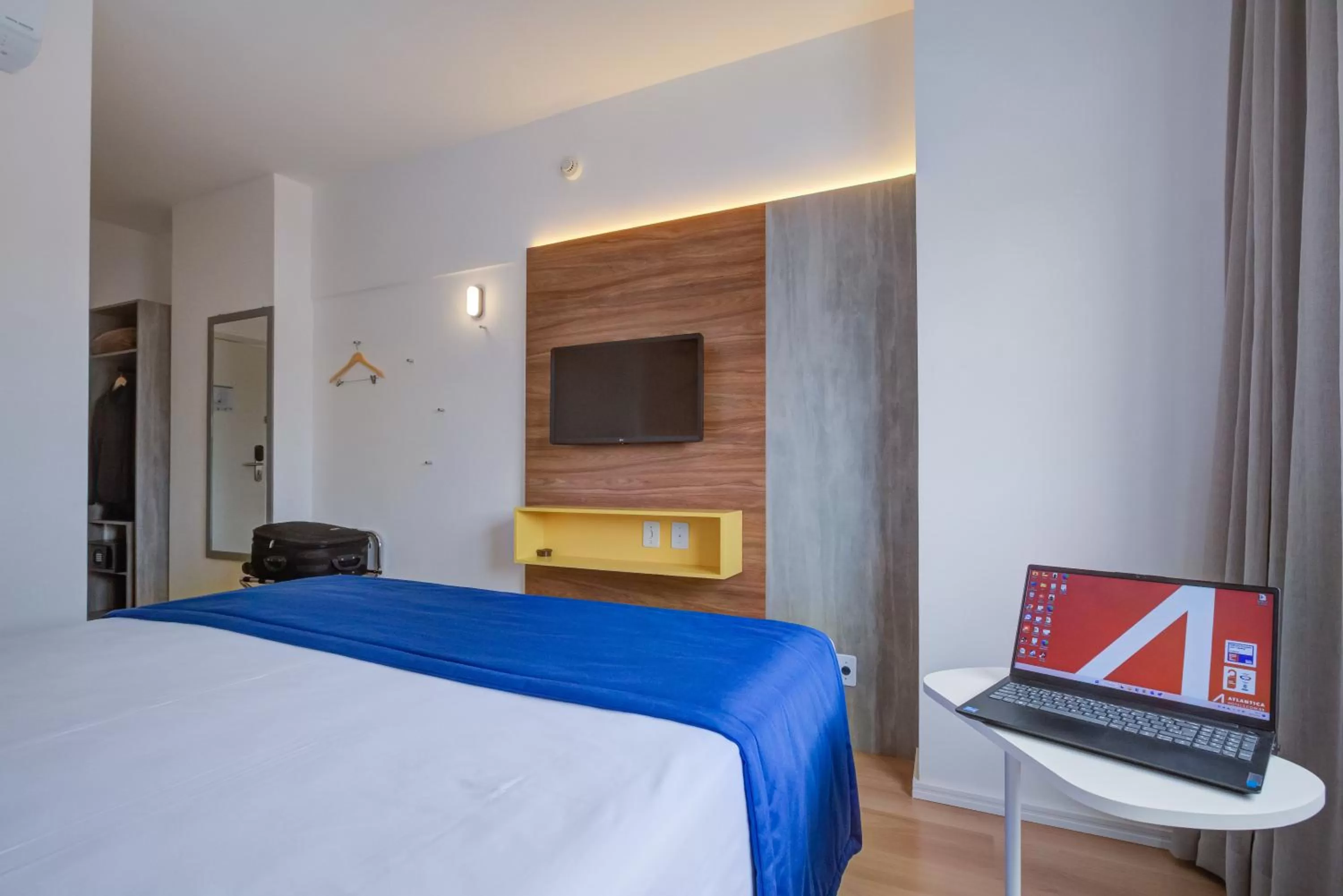 Photo of the whole room, Bed in Ramada Encore Cruzeiro