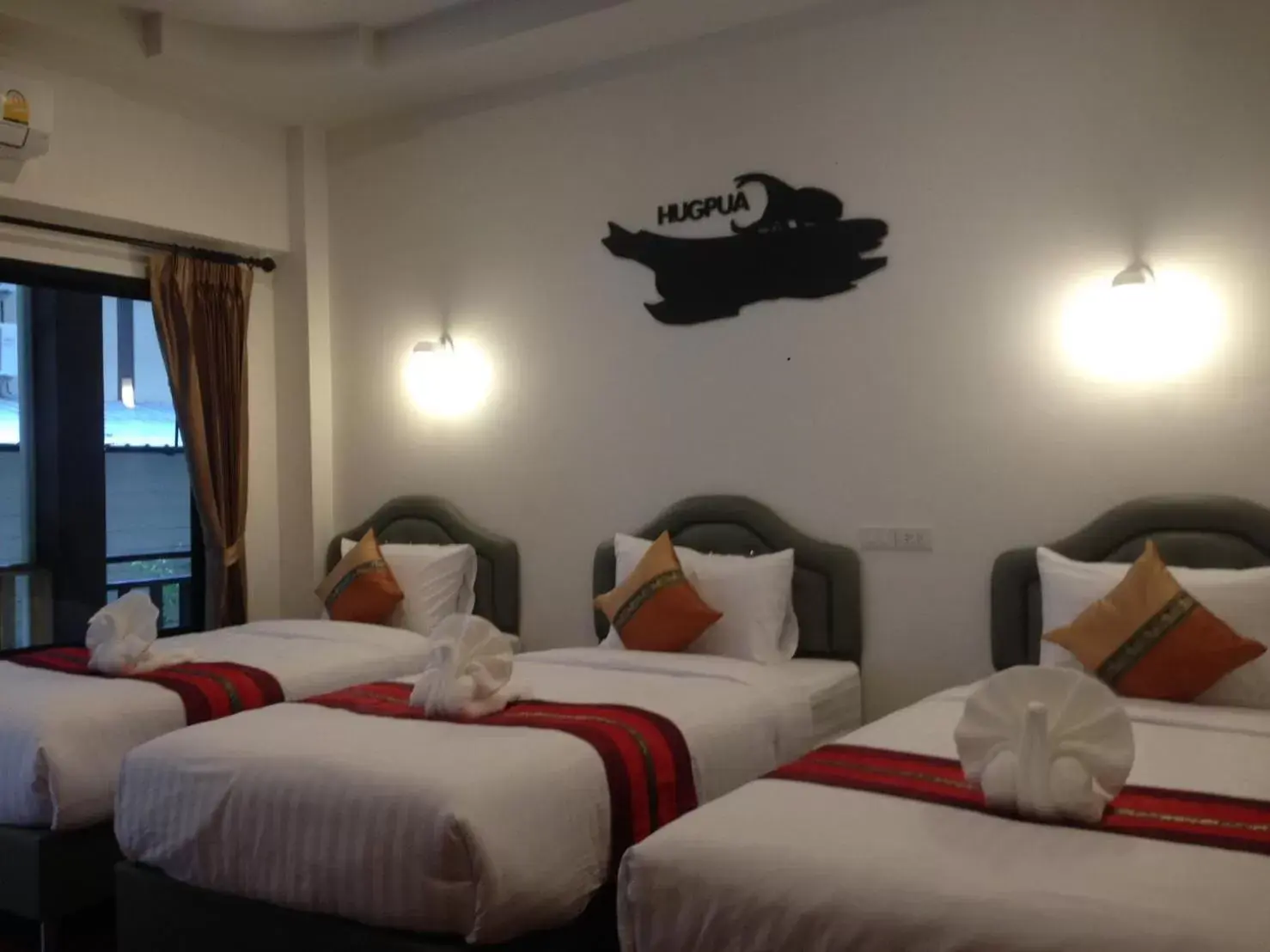 Deluxe Triple Room in Hugpua Hotel Deluxe Triple Room in Hugpua Hotel