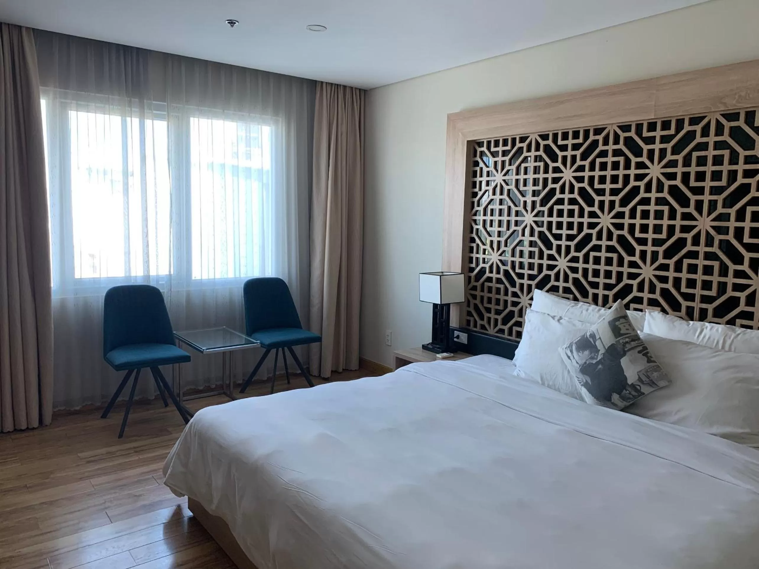 Photo of the whole room, Bed in Gemini Saigon LUXURY