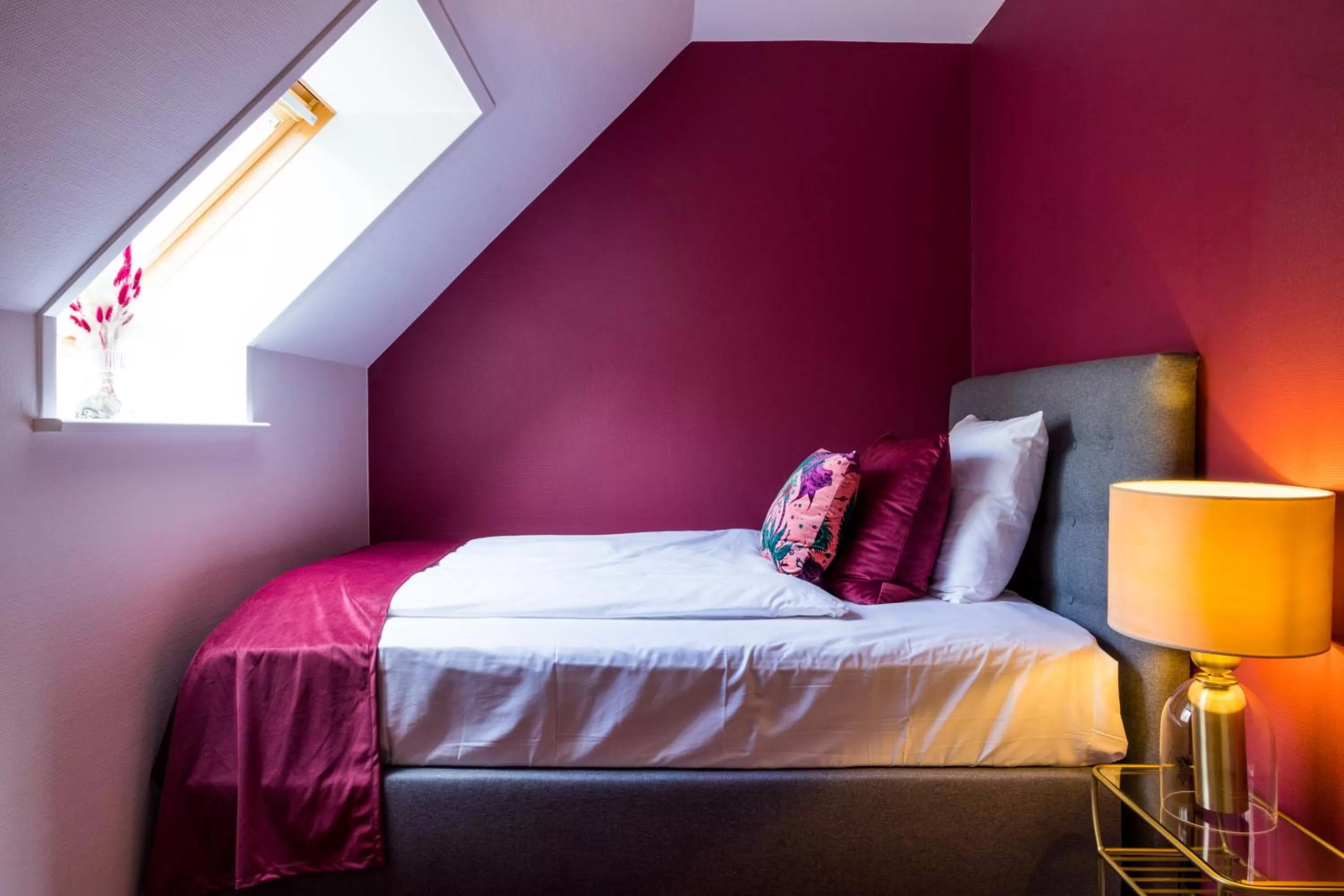 Bed in Gem Suites Holiday Apartments